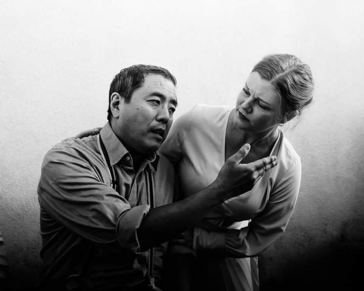 Doomed Love In A Jail: Tae Ho Yoon as the condemned man Earl Williams shares a moment of tenderness with Tamara Koltes as his one true friend Molly Malloy in The CCPT revival of The Front Page.