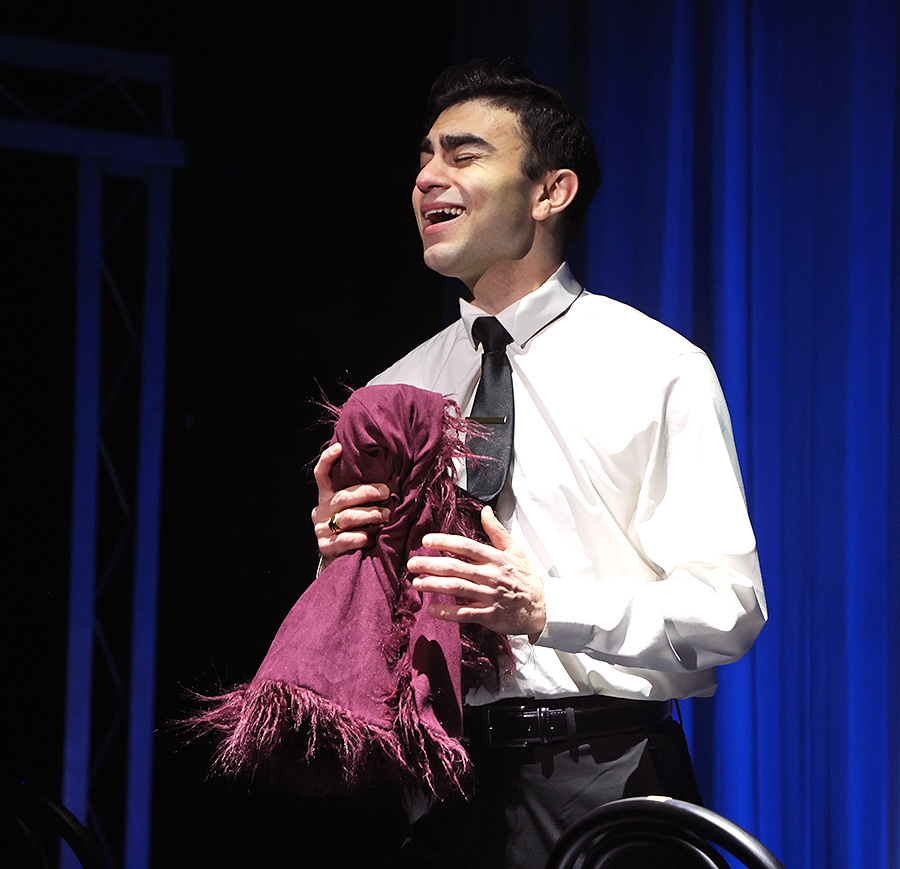 Frankie Valli (Gian Raffaele DiCostanzo) sings Fallen Angel in Beef & Boards Dinner Theatre''s production of Jersey Boys, now on stage through April 13. 