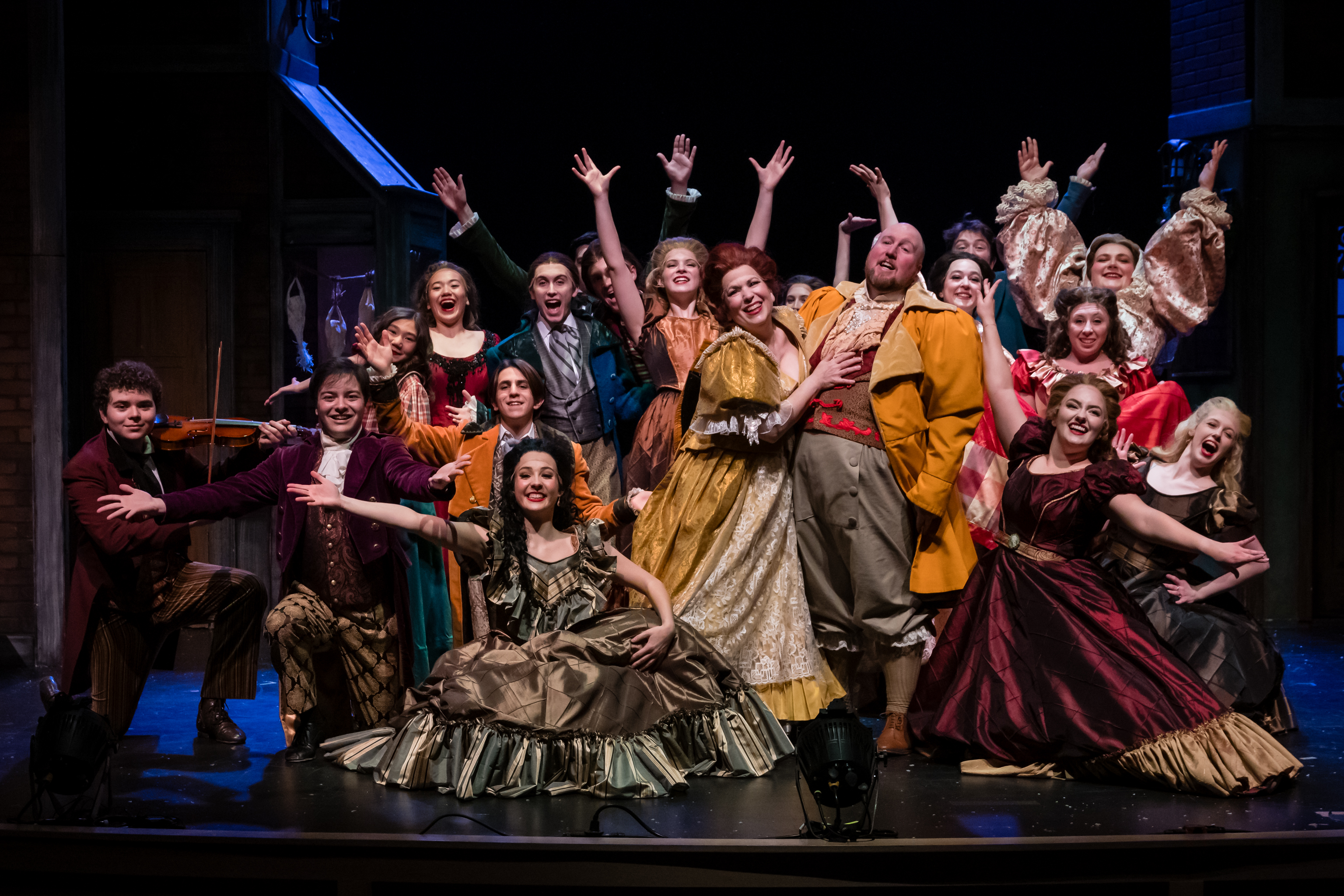 Photographer: Jesse Barnett, featured the 2023 cast of Emerald City Theatrical''s A Christmas Carol the Musical performing Mr. Fezziwig''s Annual Christmas Ball