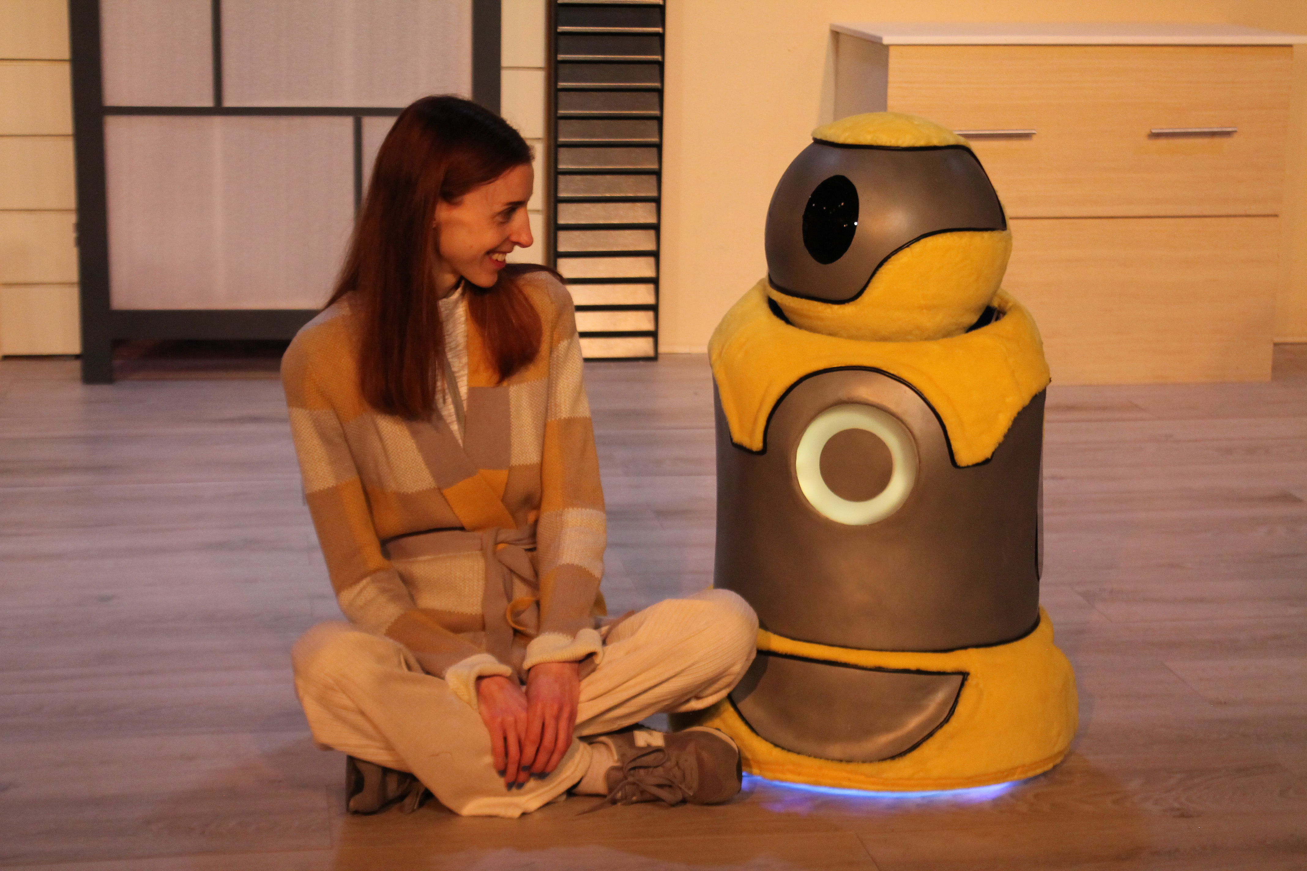 Anna (Caity Brown) and Artie sharing a moment.