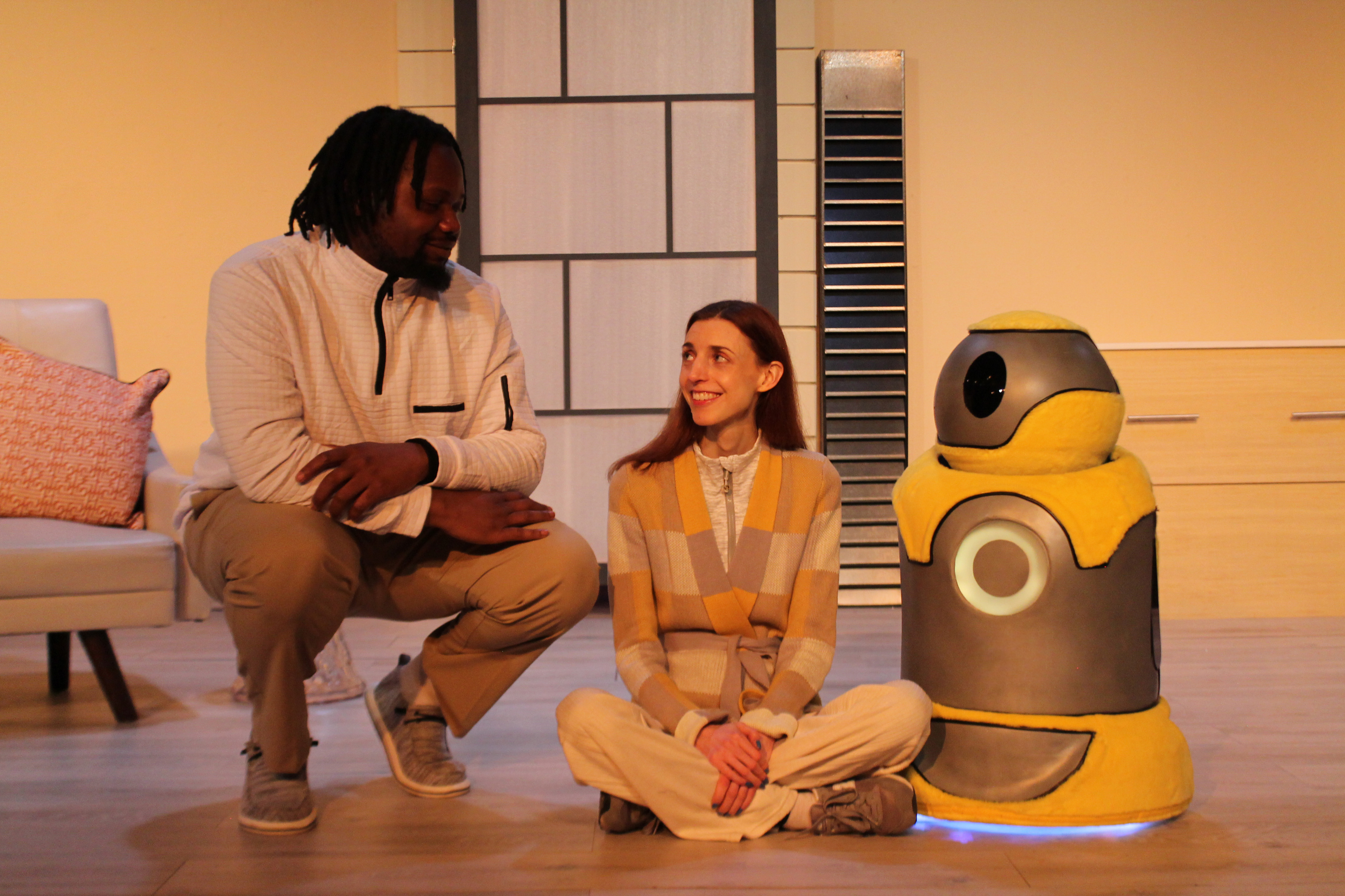 Oliver (Jamil Long), Anna (Caity Brown), and Artie together.