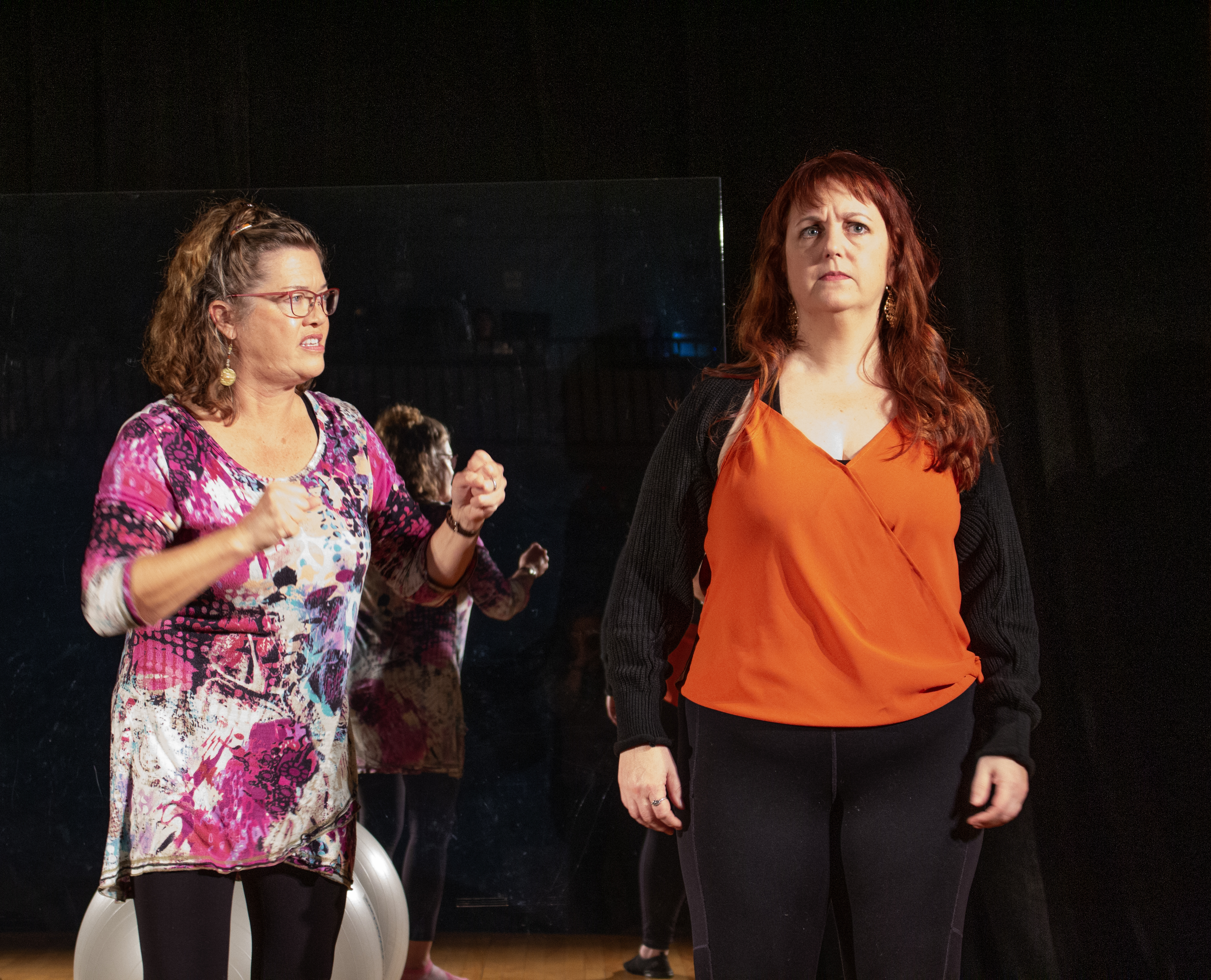 Marty (Elizabeth Bates) coaches Theresa (Kym Taylor) in Circle Mirror Transformation with The Shelburne Players.