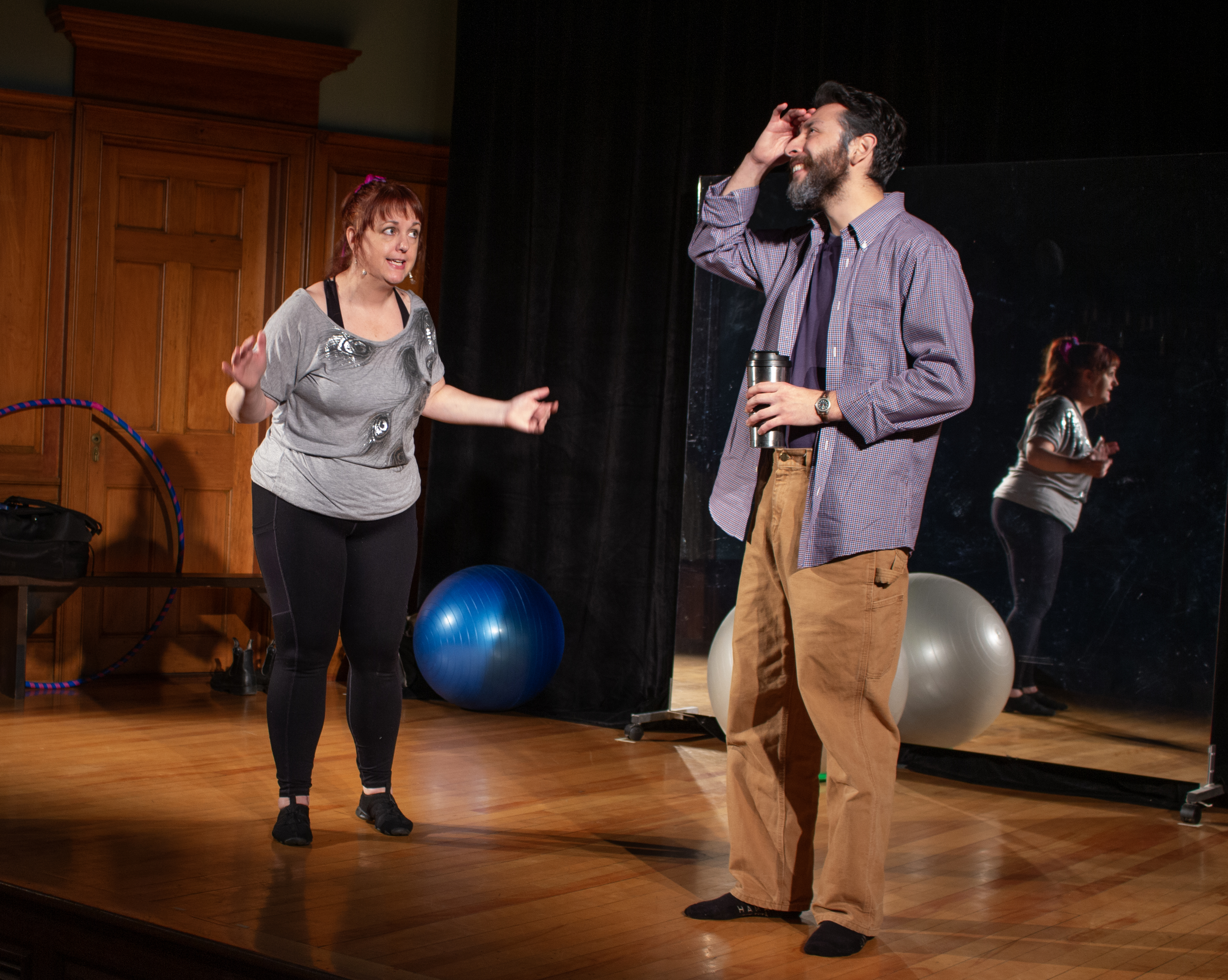 Theresa (Kym Taylor) argues with Schultz (Chris Acosta) in Circle Mirror Transformation with The Shelburne Players.