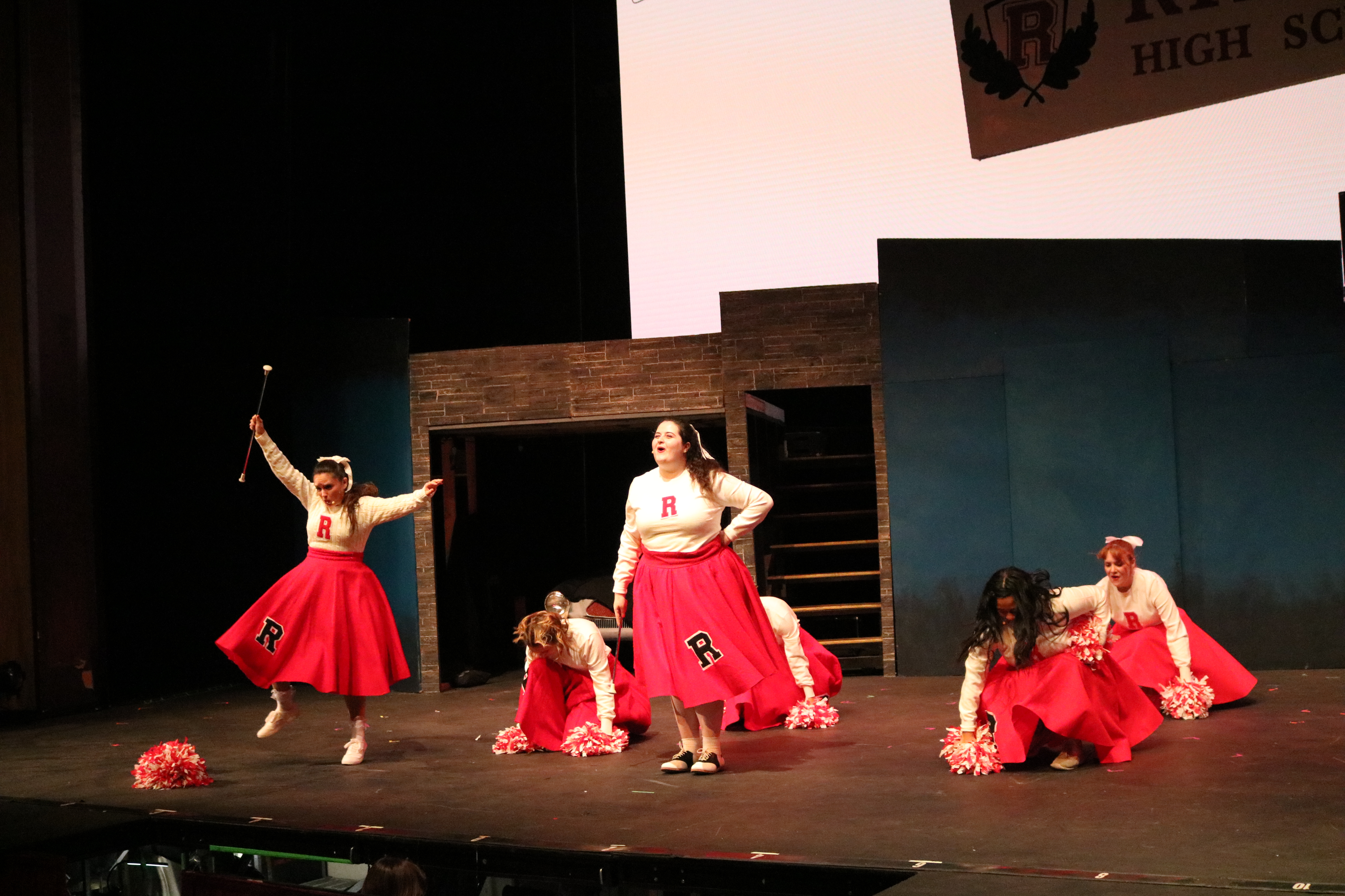 Katelyn Coon and the cast of Grease