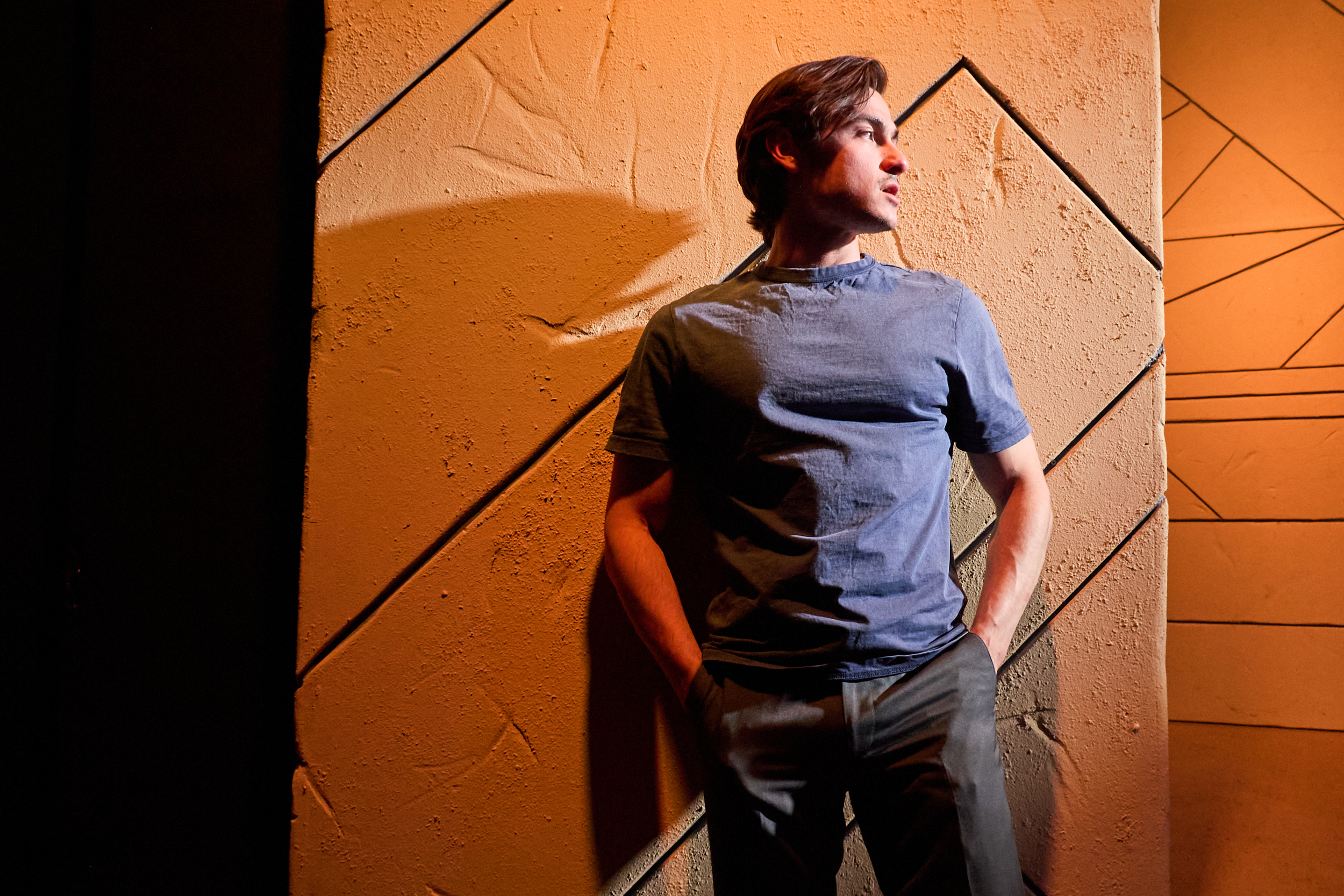 Noah Mutterperl (as assassin Yigal Amir at the rally). Photo by Peggy Ryan Noah Mutterperl (as assassin Yigal Amir at the rally). Photo by Peggy Ryan