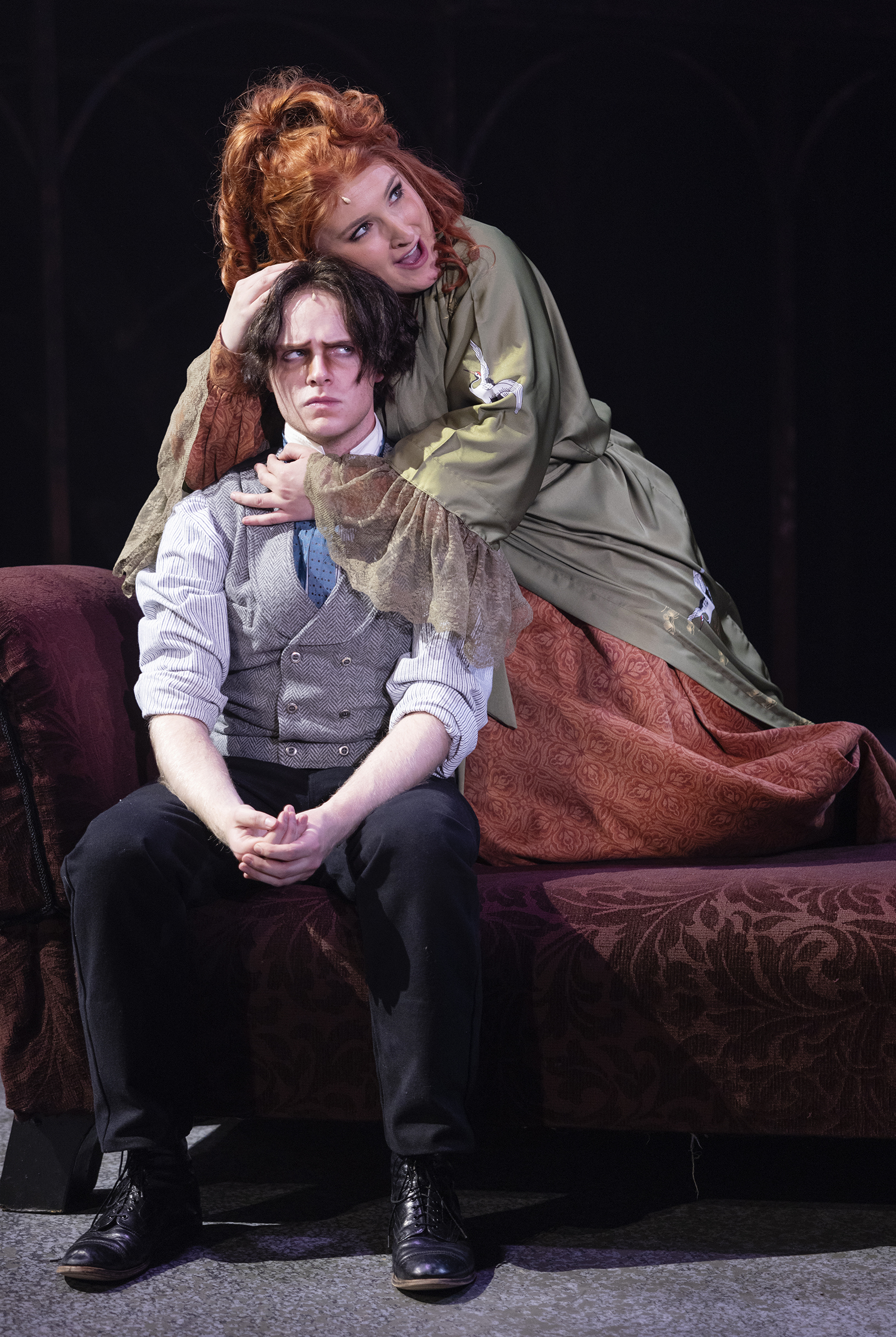 Sweeney Todd (James Kelley Carroll) and Mrs. Lovett (Grace Gebara) . Photo by Tim Fuller. Scenic Design by Joe C. Klug. Costume Design by Patrick Holt. Lighting Design by Ken Phillips. Sound Design