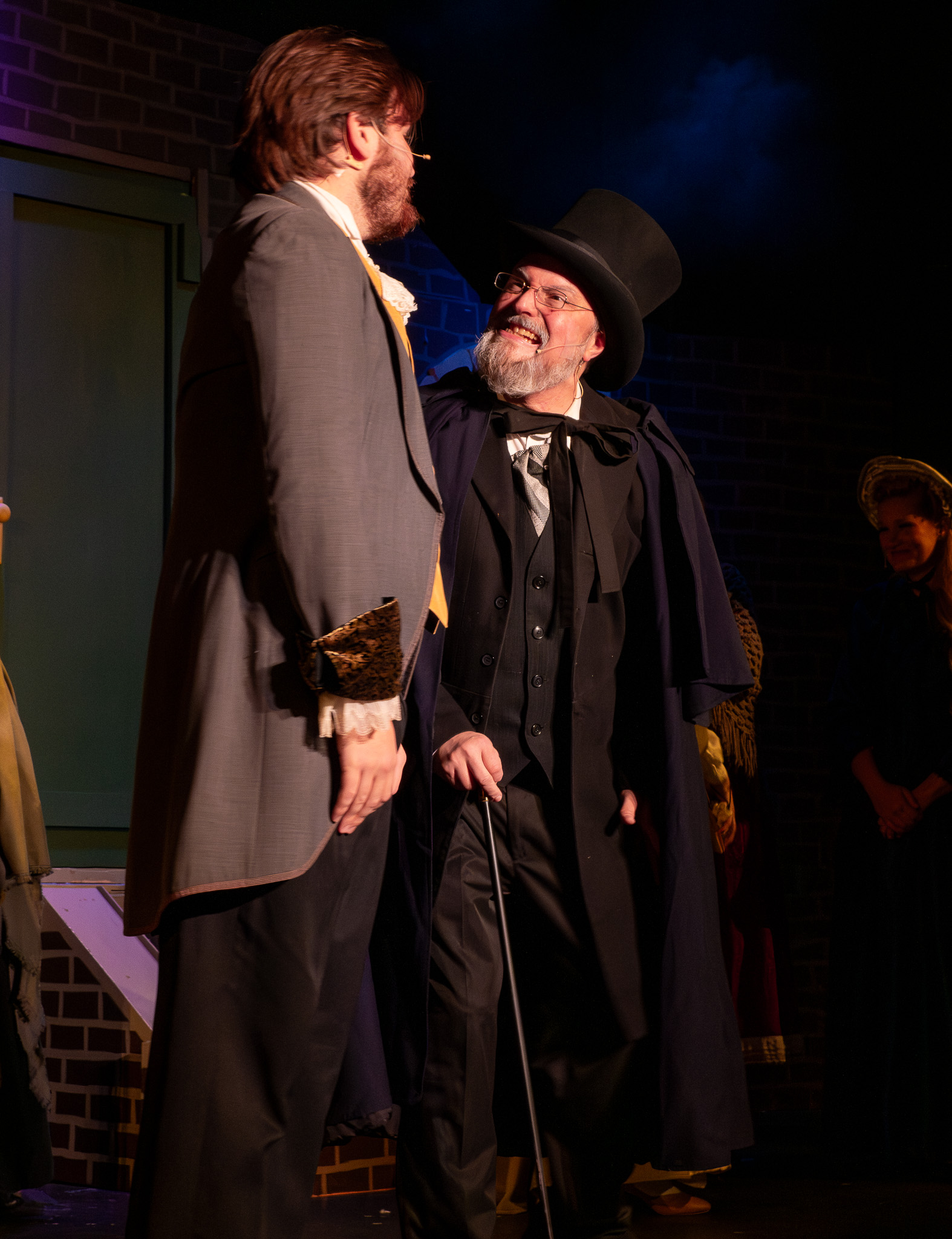 L TO R: Matt Summers as Fred, Darrell Meek as Scrooge 