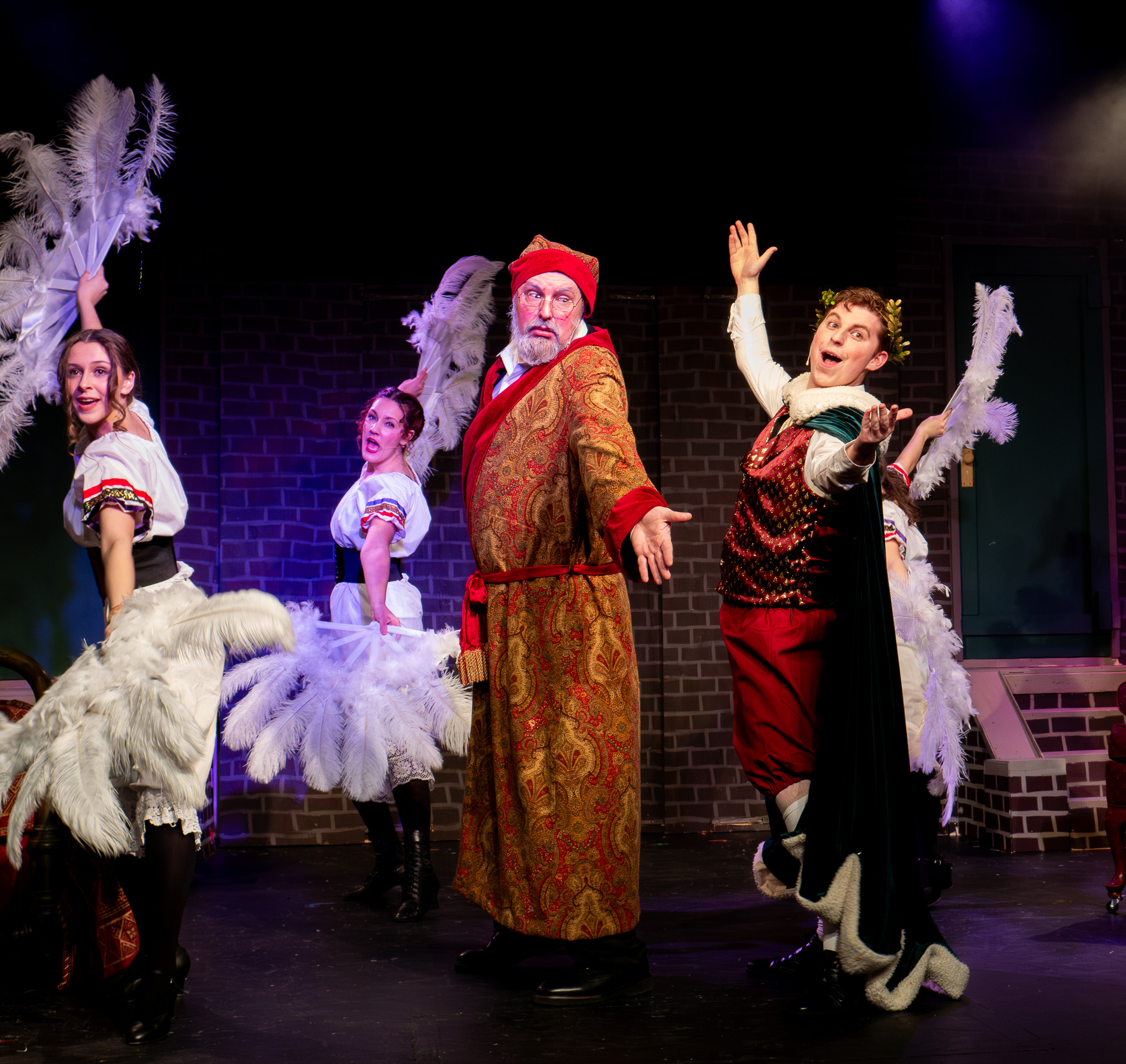 L TO R: Claire Z as Ensemble, Kate Phillip as Ensemble, Darrell Meek as Scrooge, Justin Roth as Present