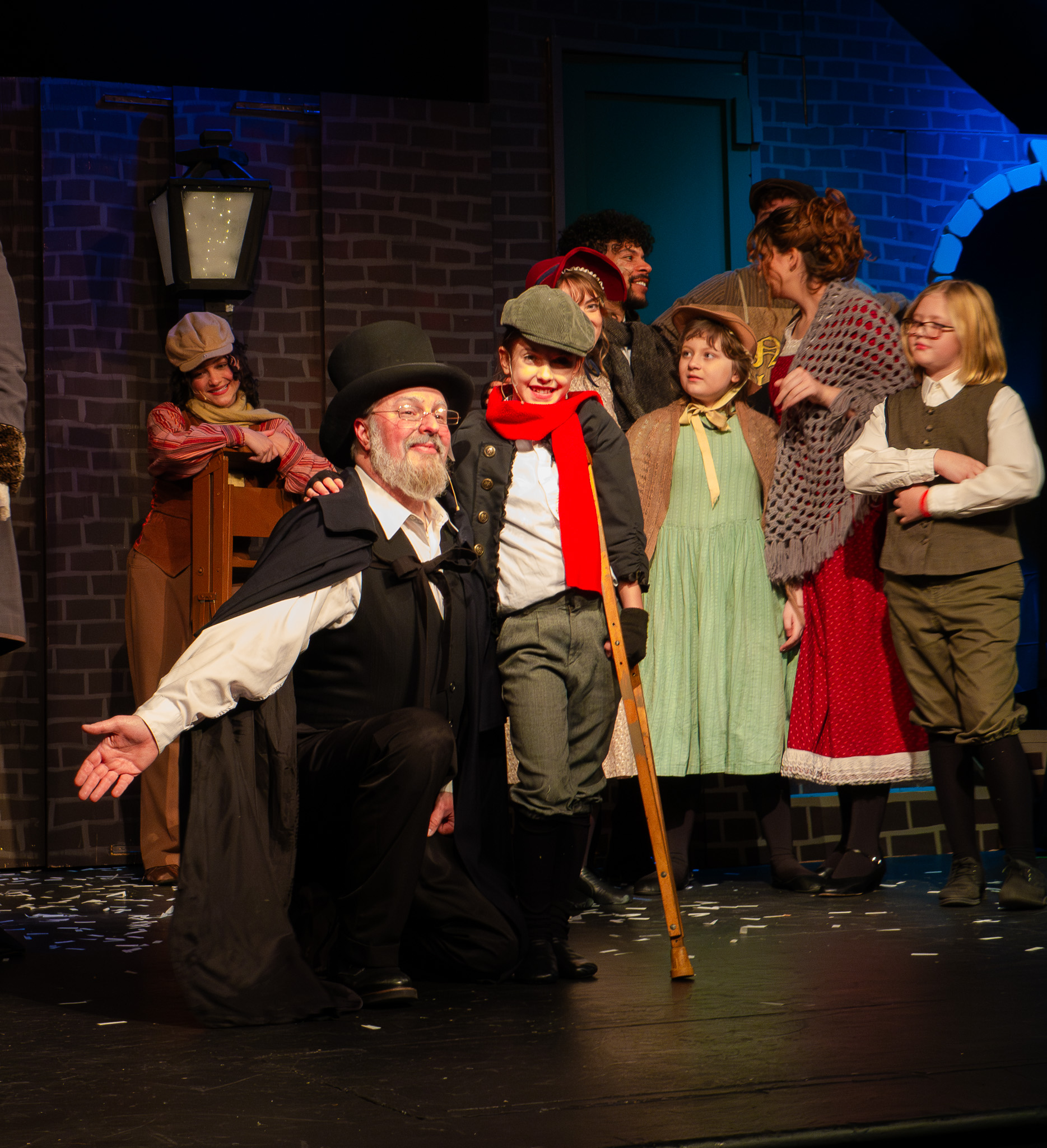 L to R: Darrell Meek as Scrooge, Abby C. as Tiny Tim 
