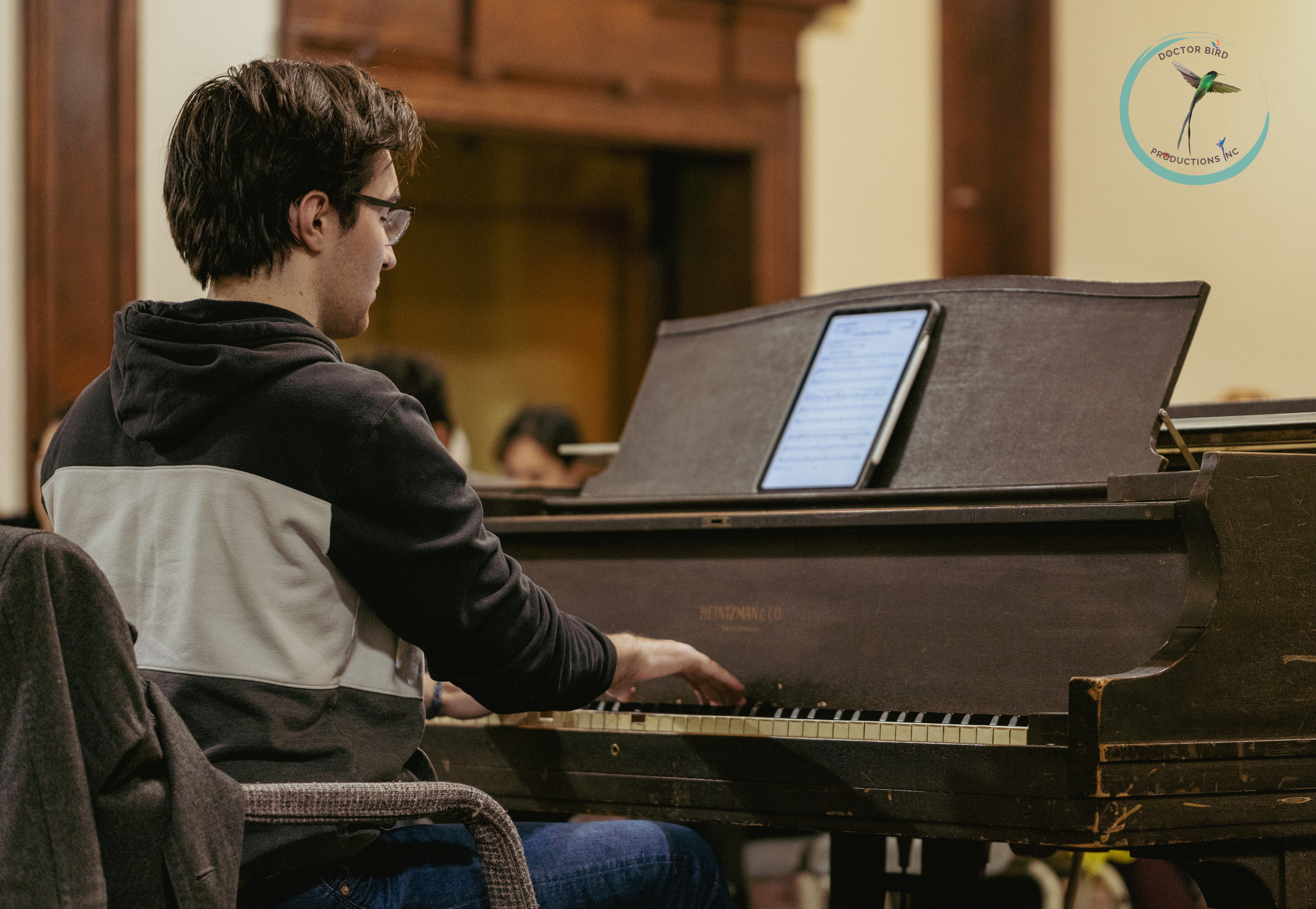 Photo of Assistant Musical Director Jayden Browne in rehearsal by Mehvish Ali