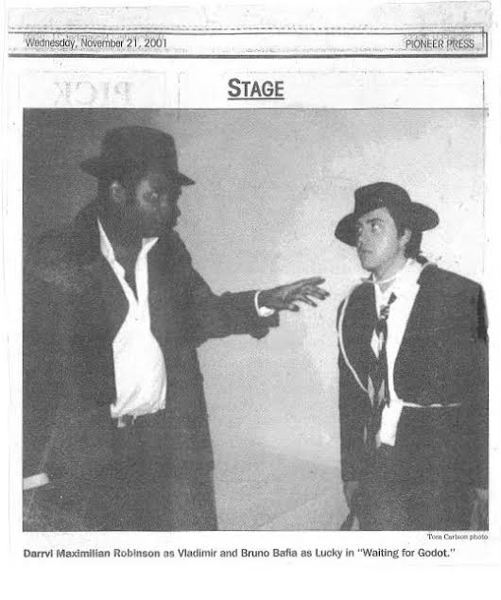 Oak Park Godot: Photo of Darryl Maximilian Robinson as Vladimir and Bruno Bafia as Lucky and The Boy in the 2001 Excaliber Shakespeare Company of Chicago revival of Waiting for Godot on Harrison St.