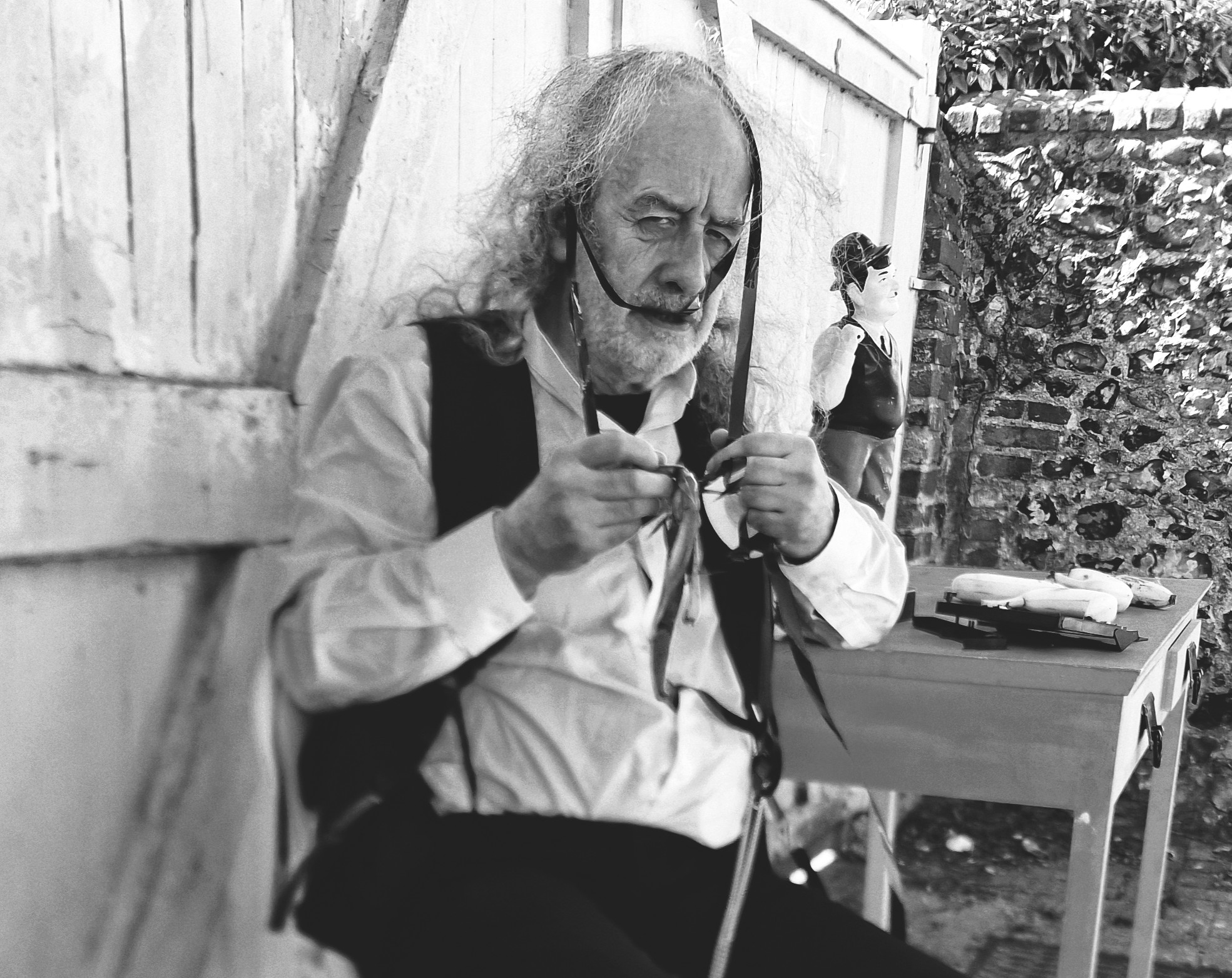 Krapp studying his tapes.