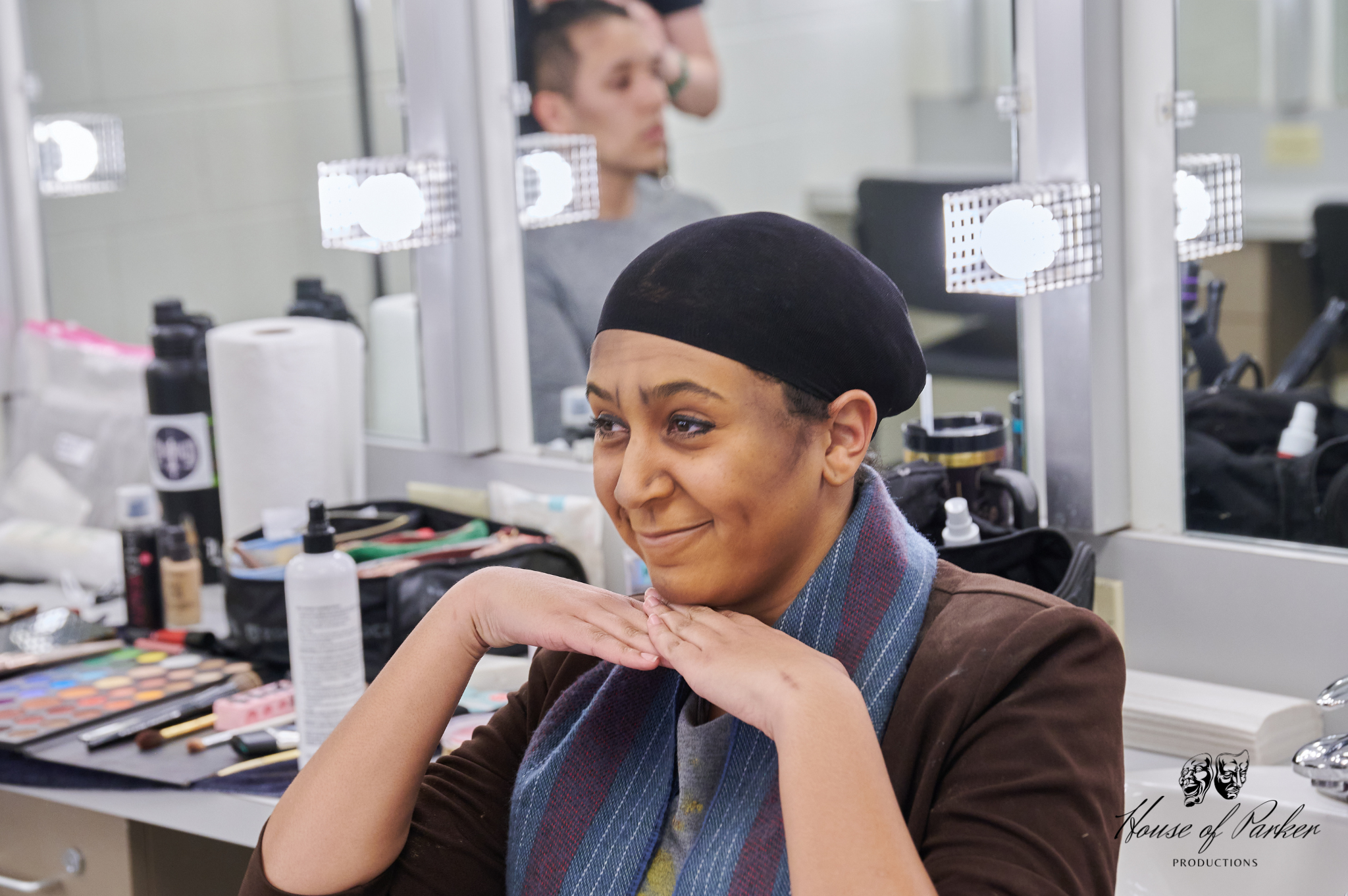Tatiana Lee in hair and makeup as the homeless woman, undergoing transformation as she prepares to embody the character on stage.