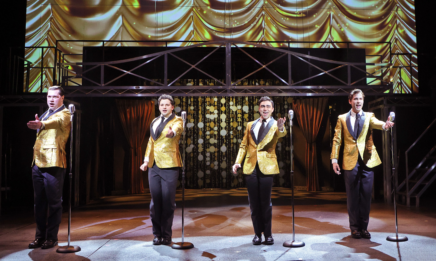 The Four Seasons perform Walk Like A Man in Be ef & Boards Dinner Theatre''s production of Jersey Boys, now on stage through April 13 . 