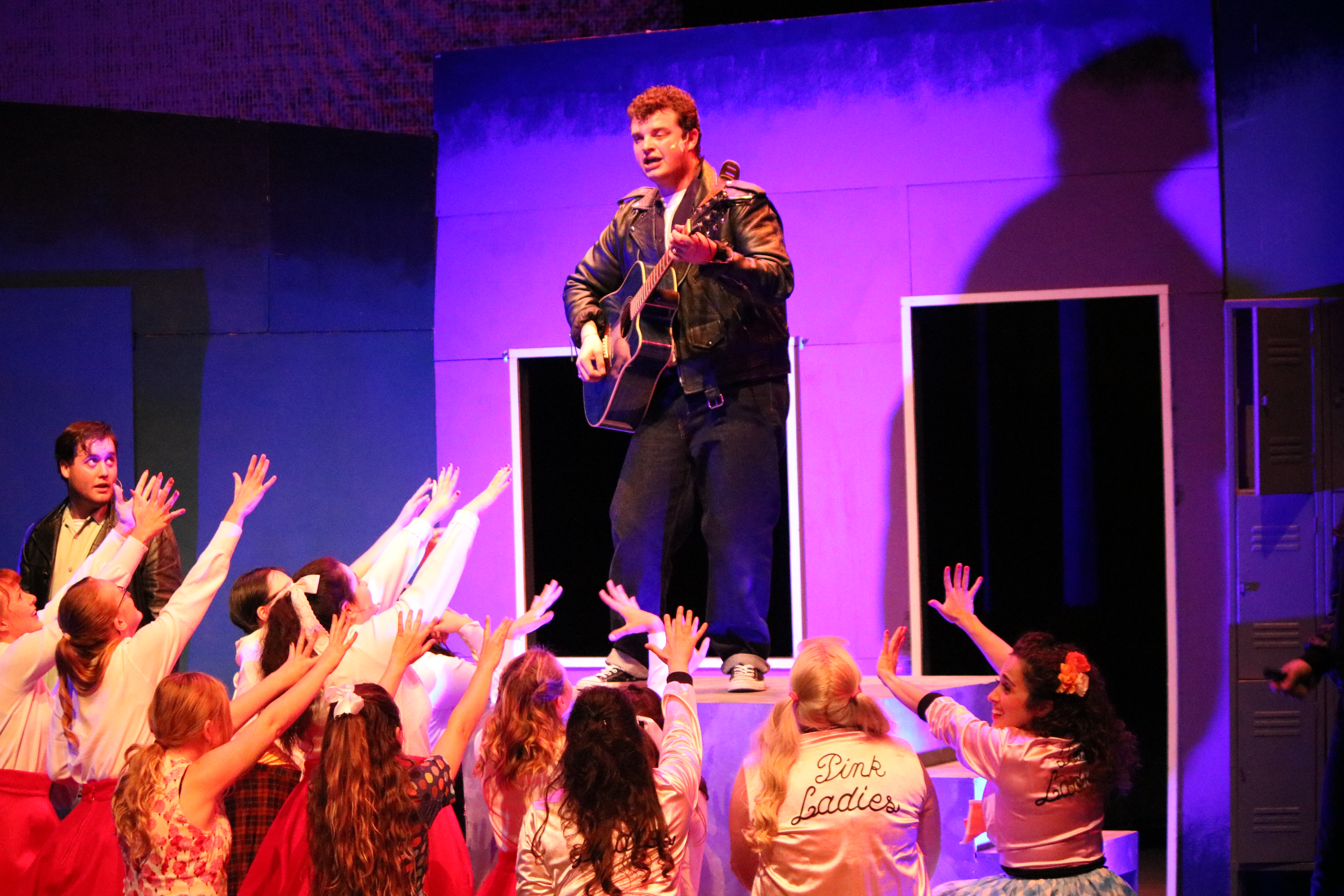Zach McDonald and the cast of Grease