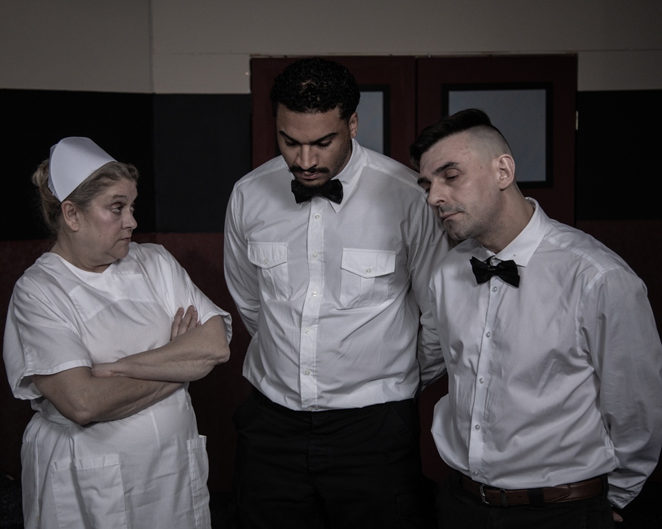 Nurse Ratched scolds her staff -- Aides Warren and Williams.