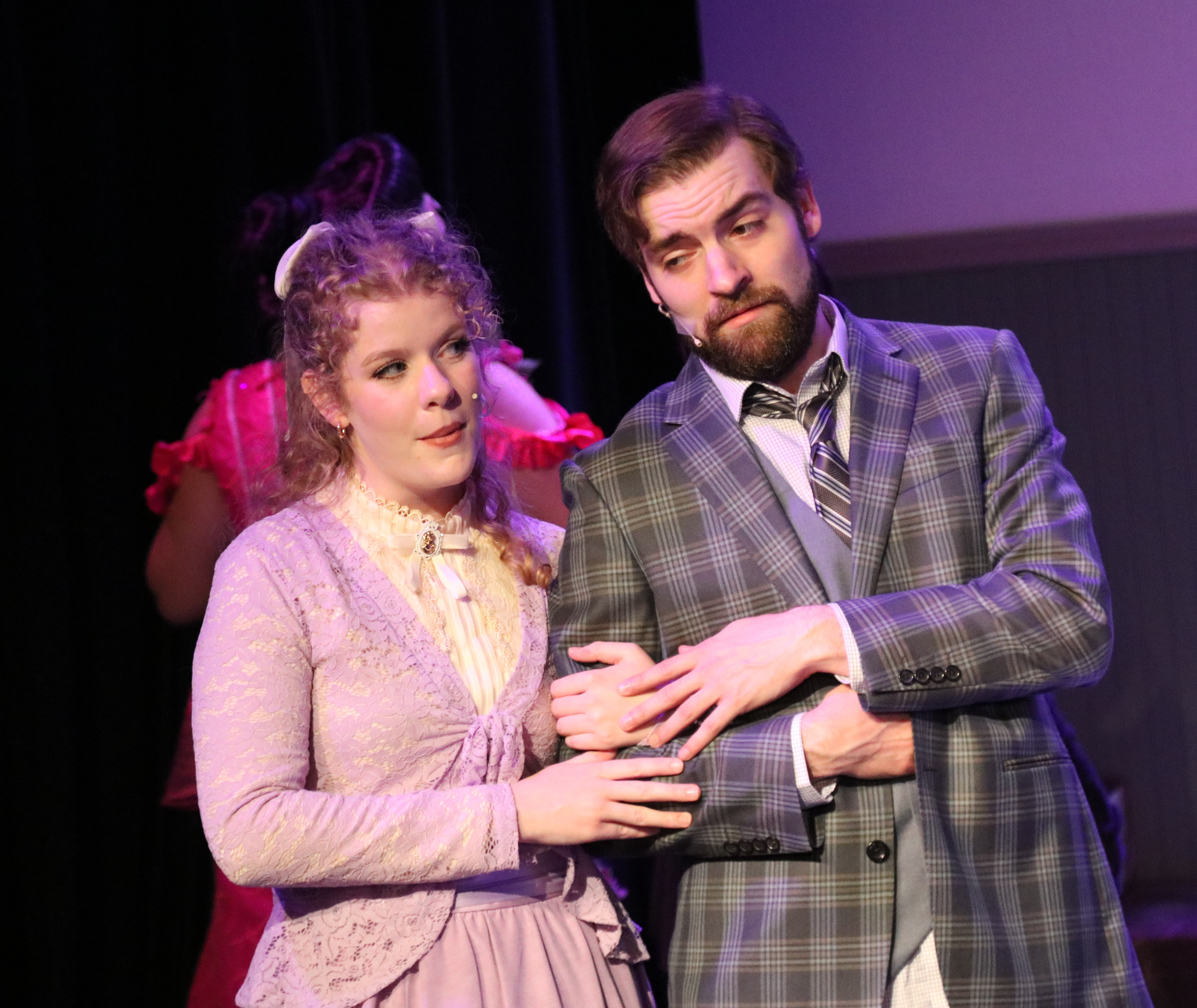 Jayne Pecena as Ermegarde and Travis Carrick as Ambrose Kemper