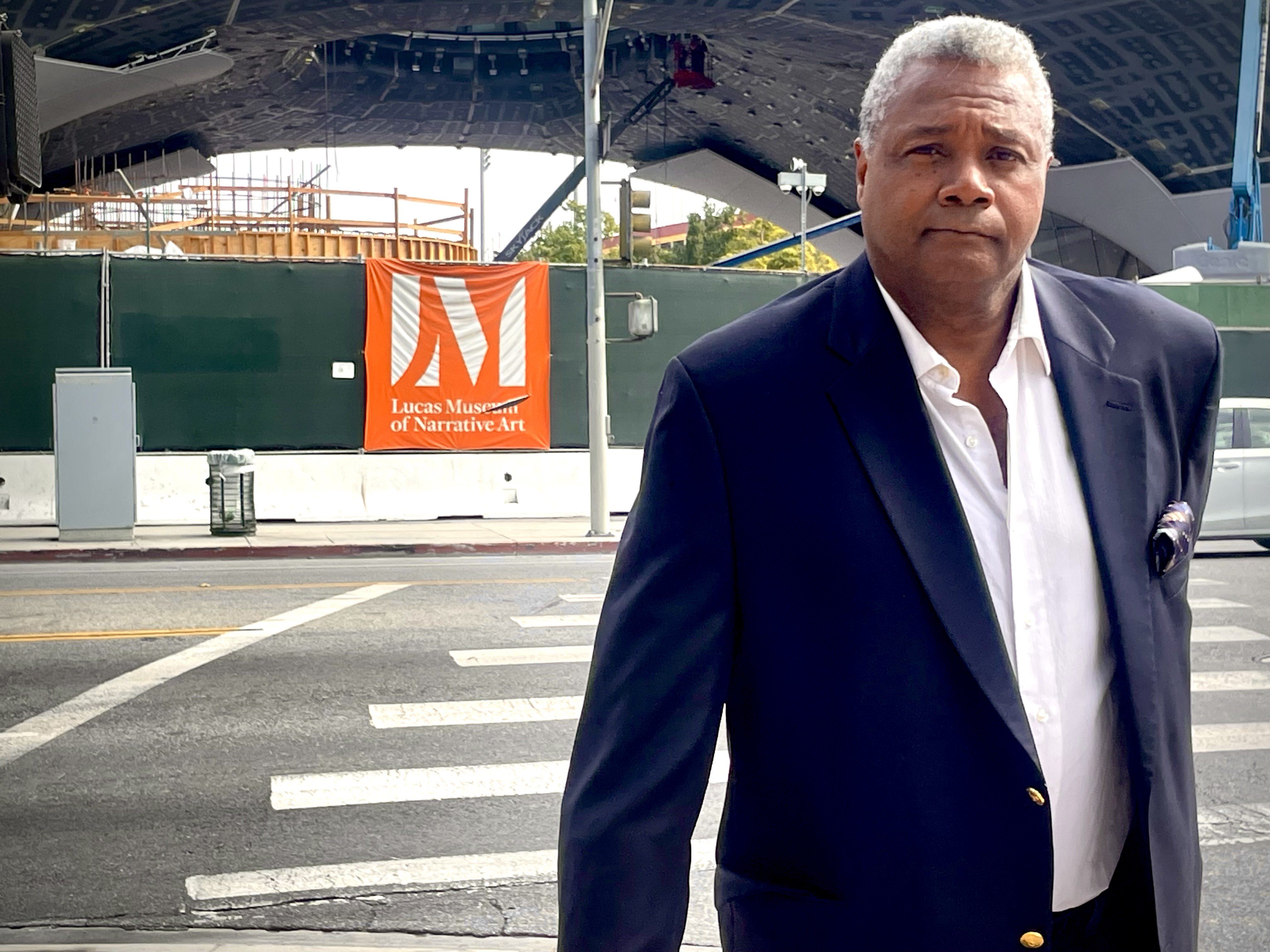 A Modern-Dress Prospero: For the video shot at the Lucas Museum of Narrative Art, Excaliber Shakespeare Company Los Angeles Archival Project Founder Darryl Maximilian Robinson dressed contemporary.