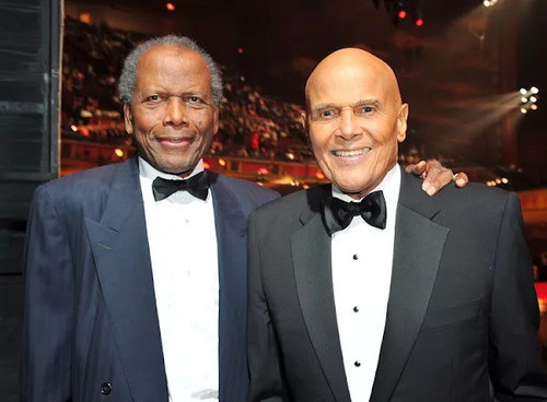 AMERICA'S FIRST AFRICAN-AMERICAN MALE PERFORMER TO WIN THE EMMY!: Here is the legendary star Harry Belafonte with his 1960 Emmy Award as Outstanding Performer for his 1959 television music special 