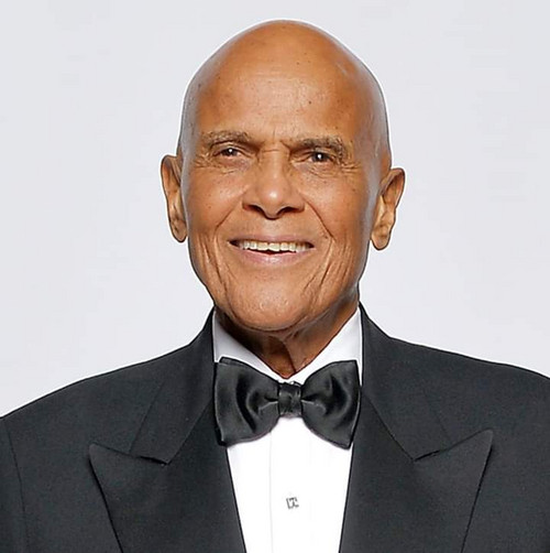 AMERICA'S FIRST AFRICAN-AMERICAN MALE PERFORMER TO WIN THE EMMY!: Here is the legendary star Harry Belafonte with his 1960 Emmy Award as Outstanding Performer for his 1959 television music special 