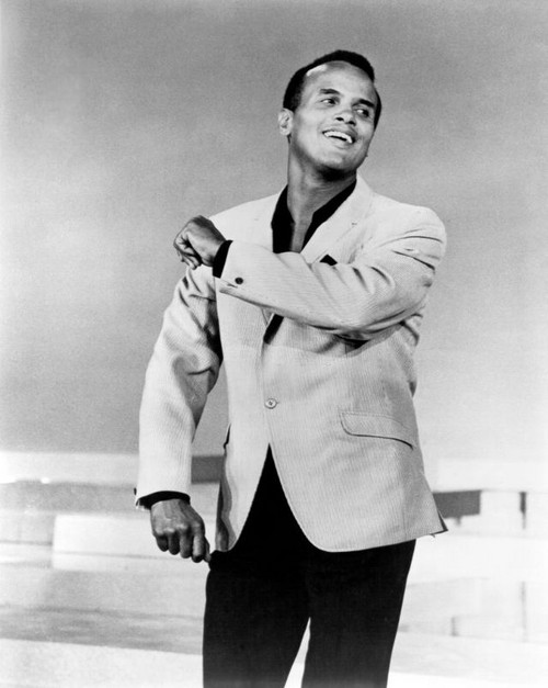 AMERICA'S FIRST AFRICAN-AMERICAN MALE PERFORMER TO WIN THE EMMY!: Here is the legendary star Harry Belafonte with his 1960 Emmy Award as Outstanding Performer for his 1959 television music special 