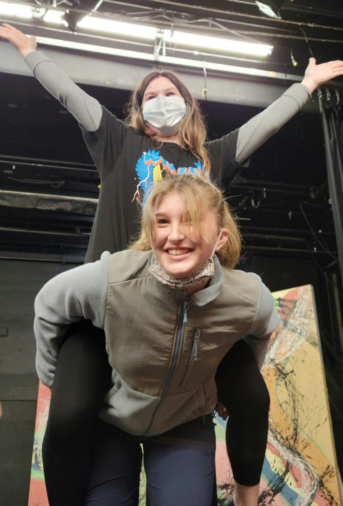  Julia Groover holds up Ansley Watson during a rehearsal for the Community Little Theatre's production of 
