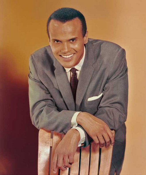 AMERICA'S FIRST AFRICAN-AMERICAN MALE PERFORMER TO WIN THE EMMY!: Here is the legendary star Harry Belafonte with his 1960 Emmy Award as Outstanding Performer for his 1959 television music special 