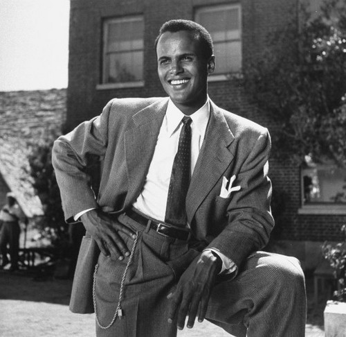 AMERICA'S FIRST AFRICAN-AMERICAN MALE PERFORMER TO WIN THE EMMY!: Here is the legendary star Harry Belafonte with his 1960 Emmy Award as Outstanding Performer for his 1959 television music special 