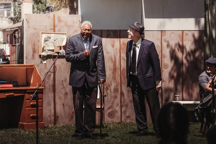 A Member of The Press Poet Society: Rizzy Fuentes as Walter Burns and Darryl Maximilian Robinson as Roy V. Bensinger in The CCPT revival of The Front Page. 44