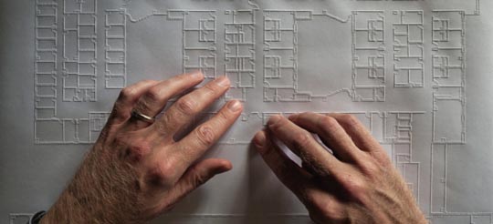 From Vantage Theatre''s BEST LAID PLANS by Robert Salerno. Photo of Chris Downey using braille for designing architecture. Photo by Don Fogg.