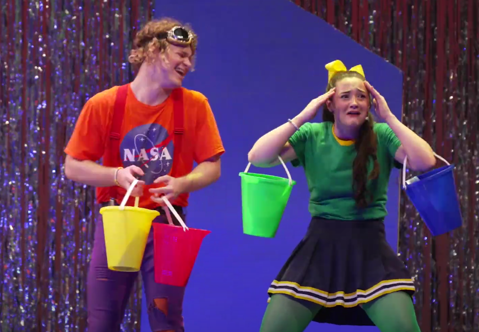 Geyser (Caleb McGuire) and Merrily (Aubrey Indorf) trying to pick a name for their group.