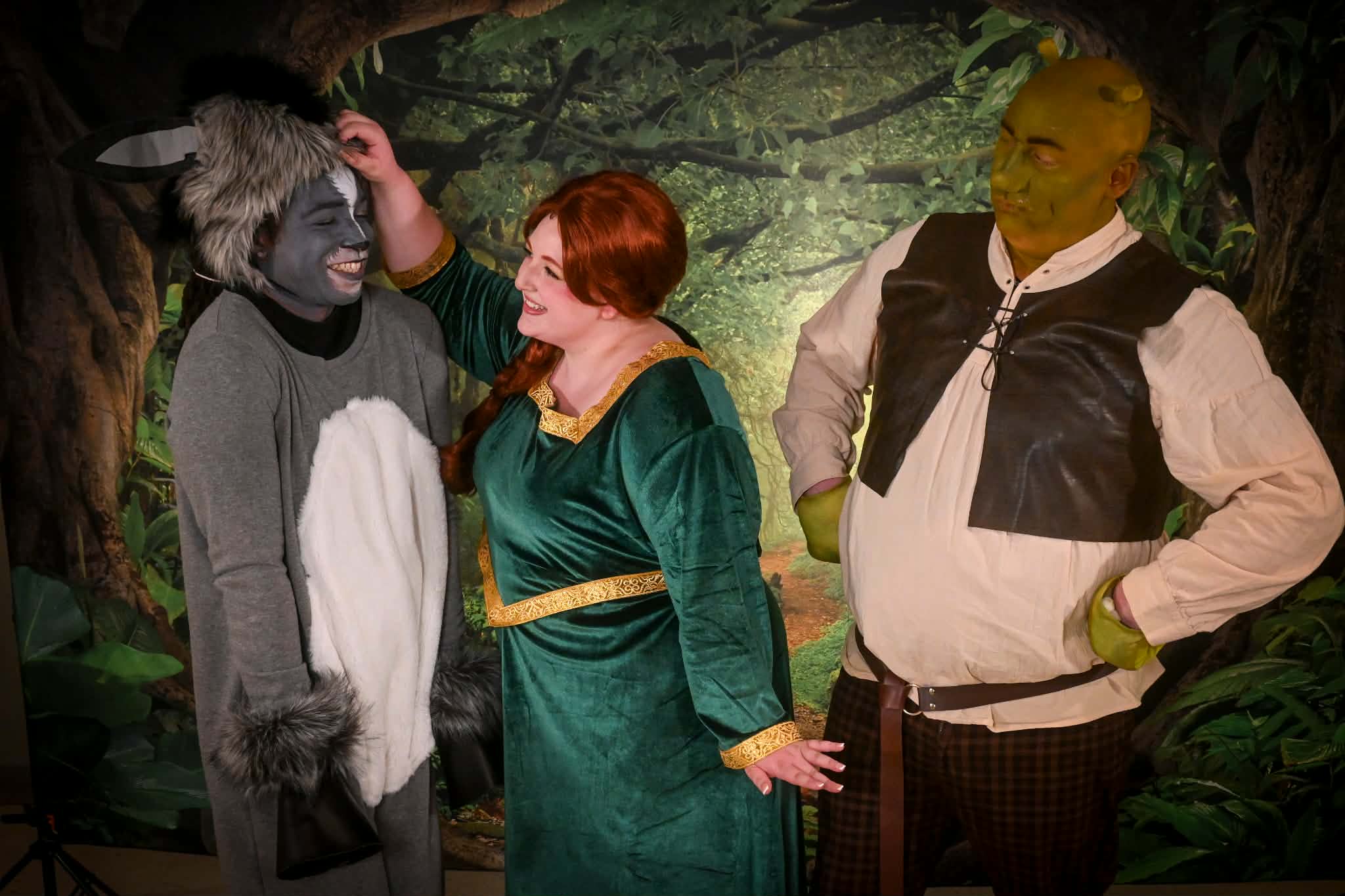 (L to R): Ki-Jana Moore as Donkey, Alexandra Overland as Fiona, and Ben Walker as Shrek.