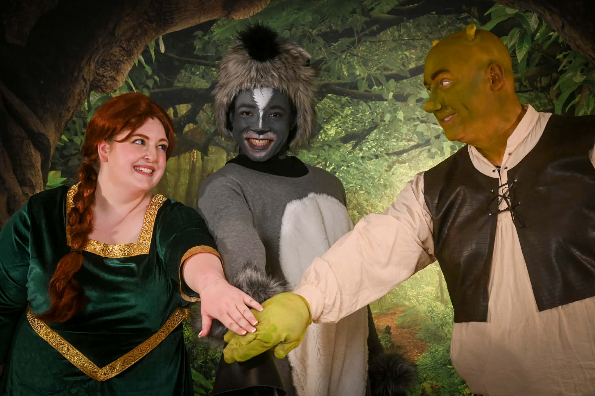 (L to R): Alexandra Overland as Fiona, Ki-Jana Moore as Donkey, and Ben Walker as Shrek.