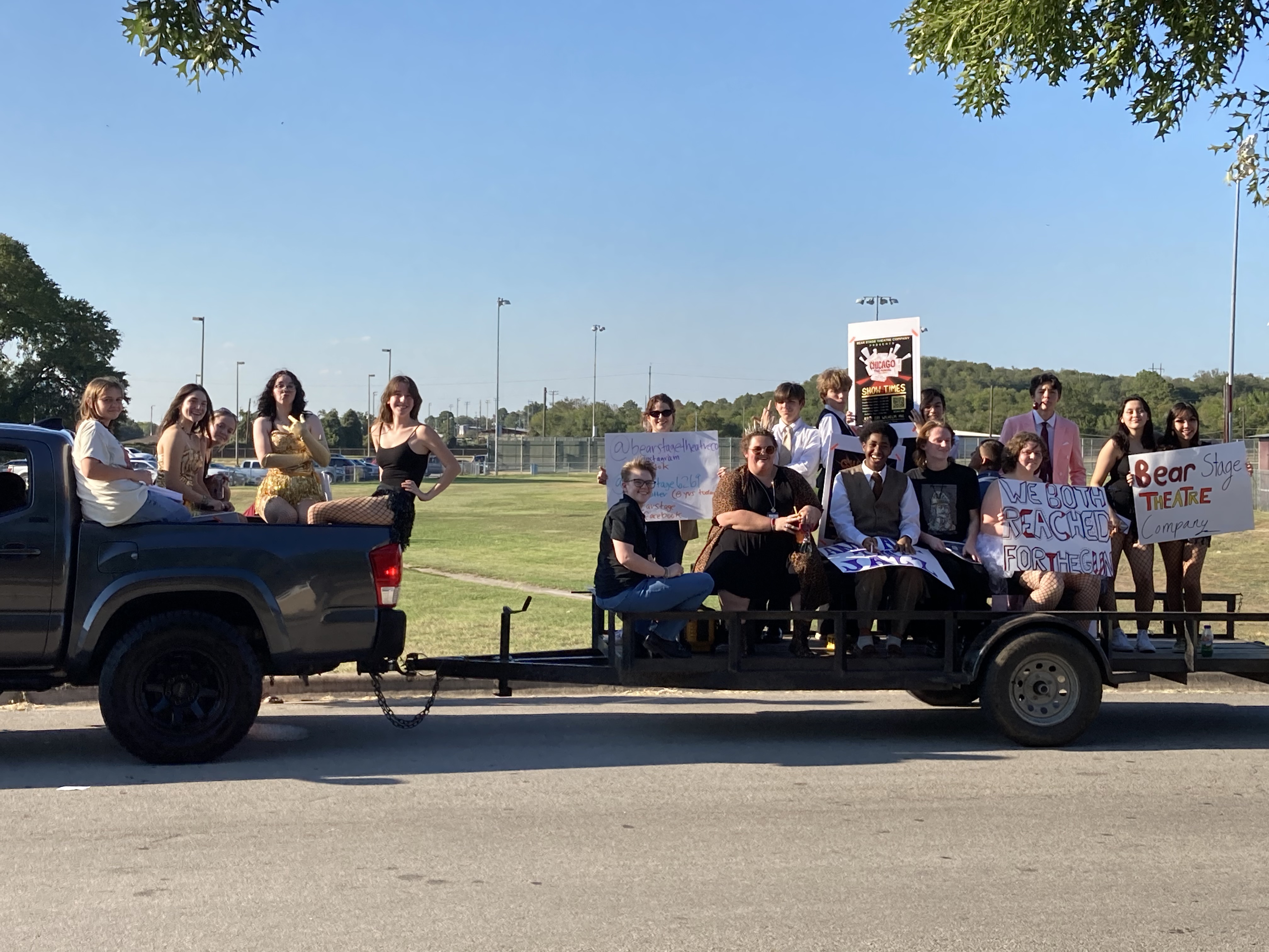 Bear Stage Theatre Co. cruises through Bastrop once again in full costume on the September 21st HOCO Parade!