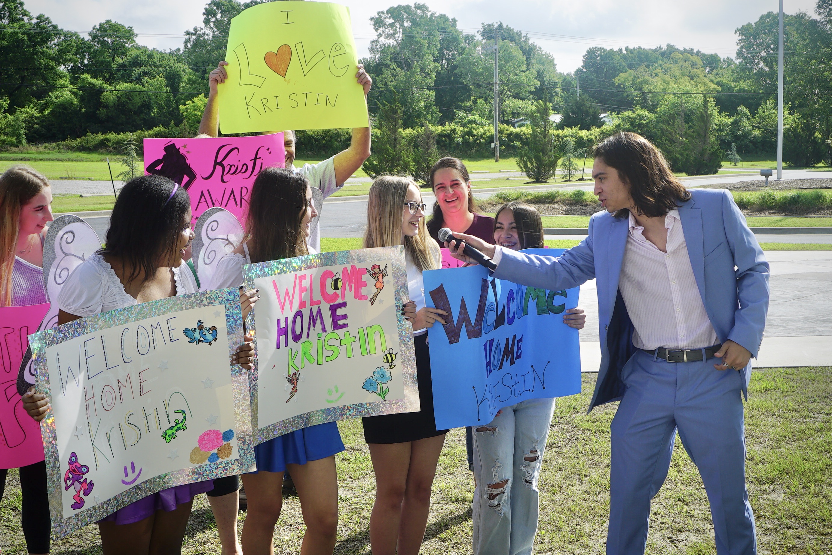 Good Morning Campers! Intern Camilo Gonzalez w/Kristin fans. Photo Credit: Merrill Mitchell