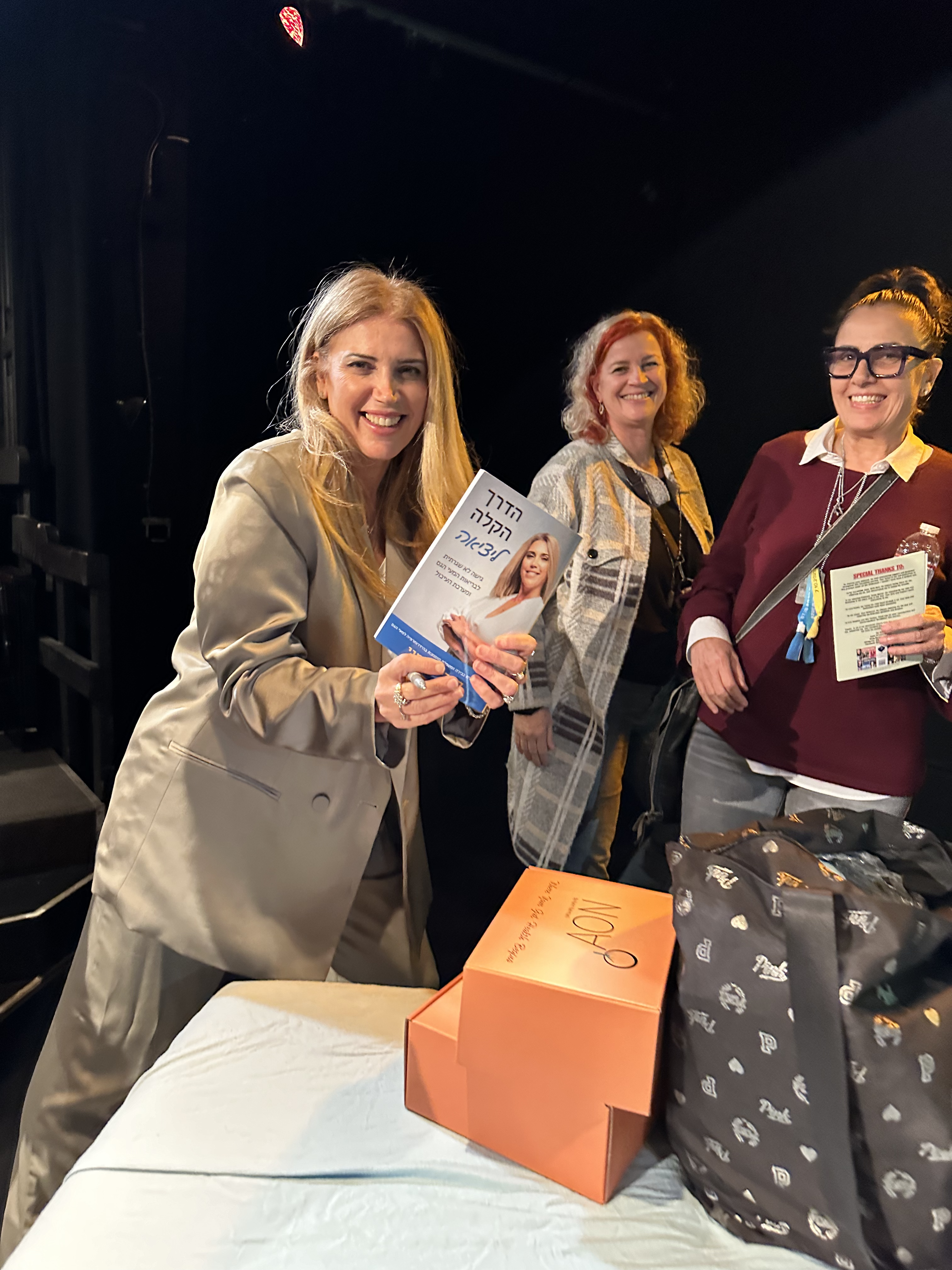 Karin Nahmani signing her book after her one-woman show