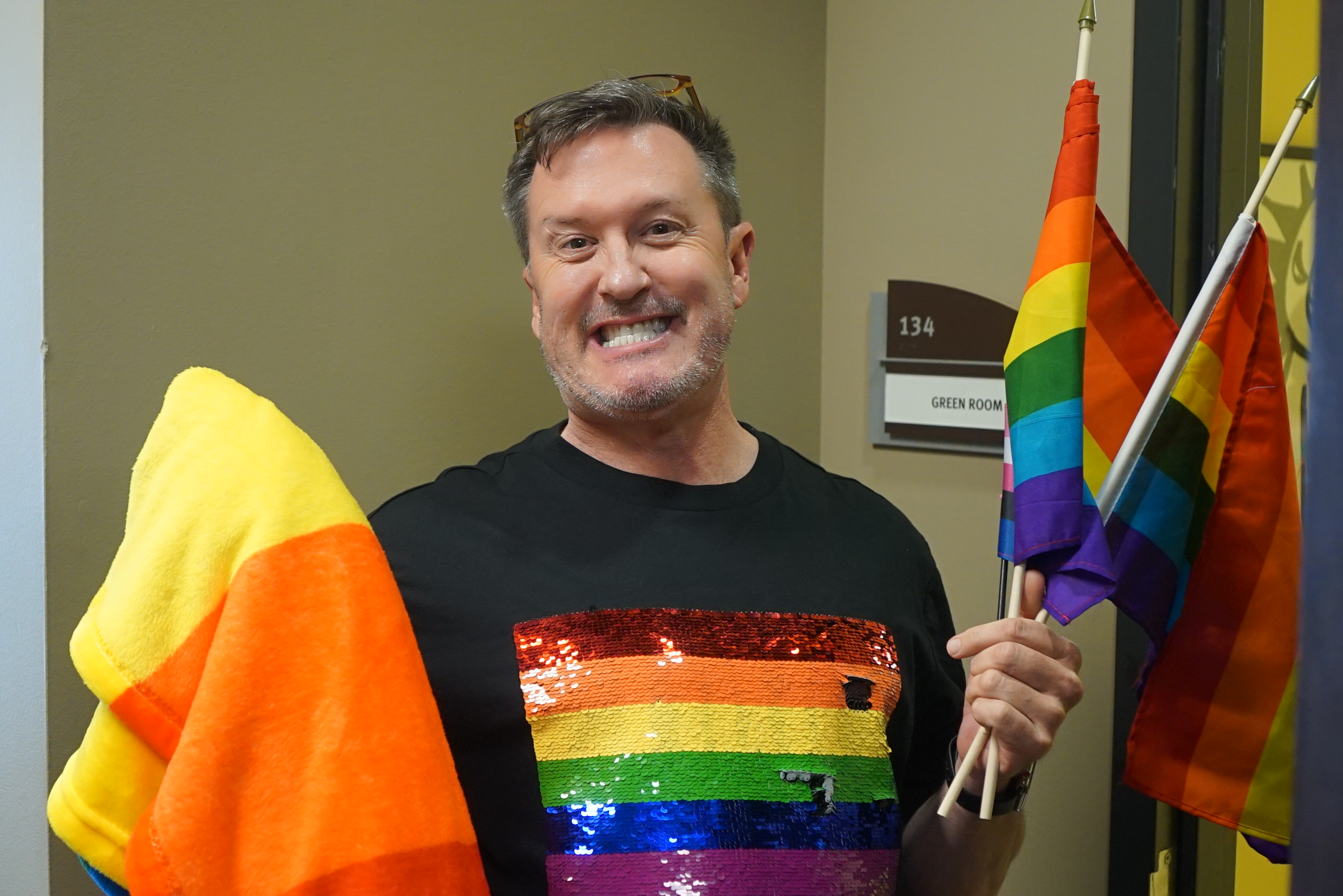 Jack Wallace prepares his gratitude session for Pride! Photo Credit: Merrill Mitchell