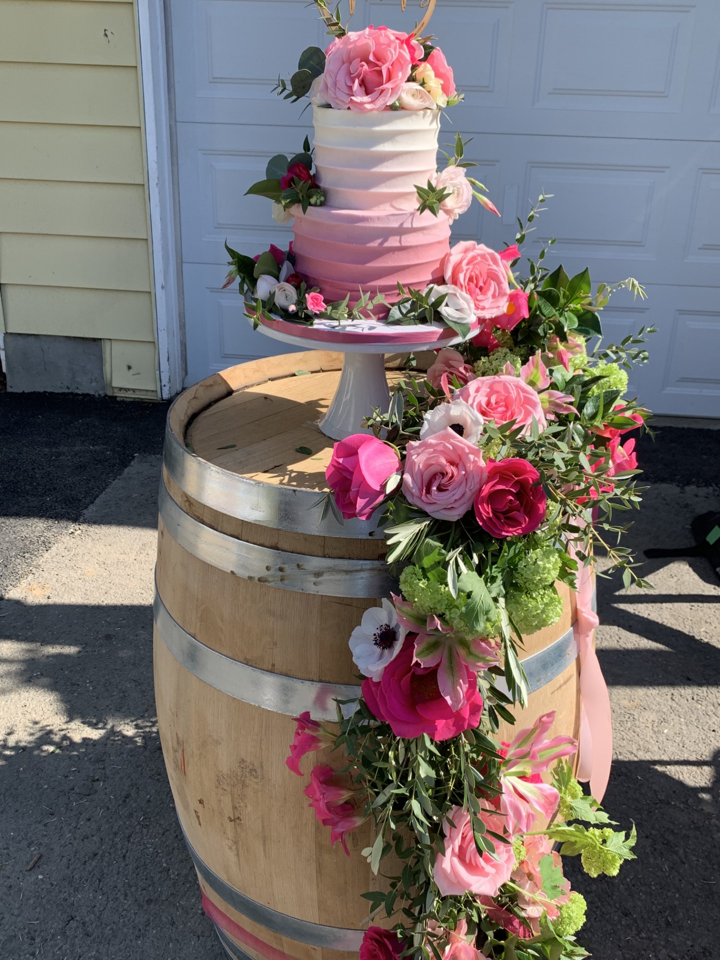 Beautiful flowers courtesy of Bouquets and Beyond Florals and Events, and delicious cake courtesy of Storeybook Cakes