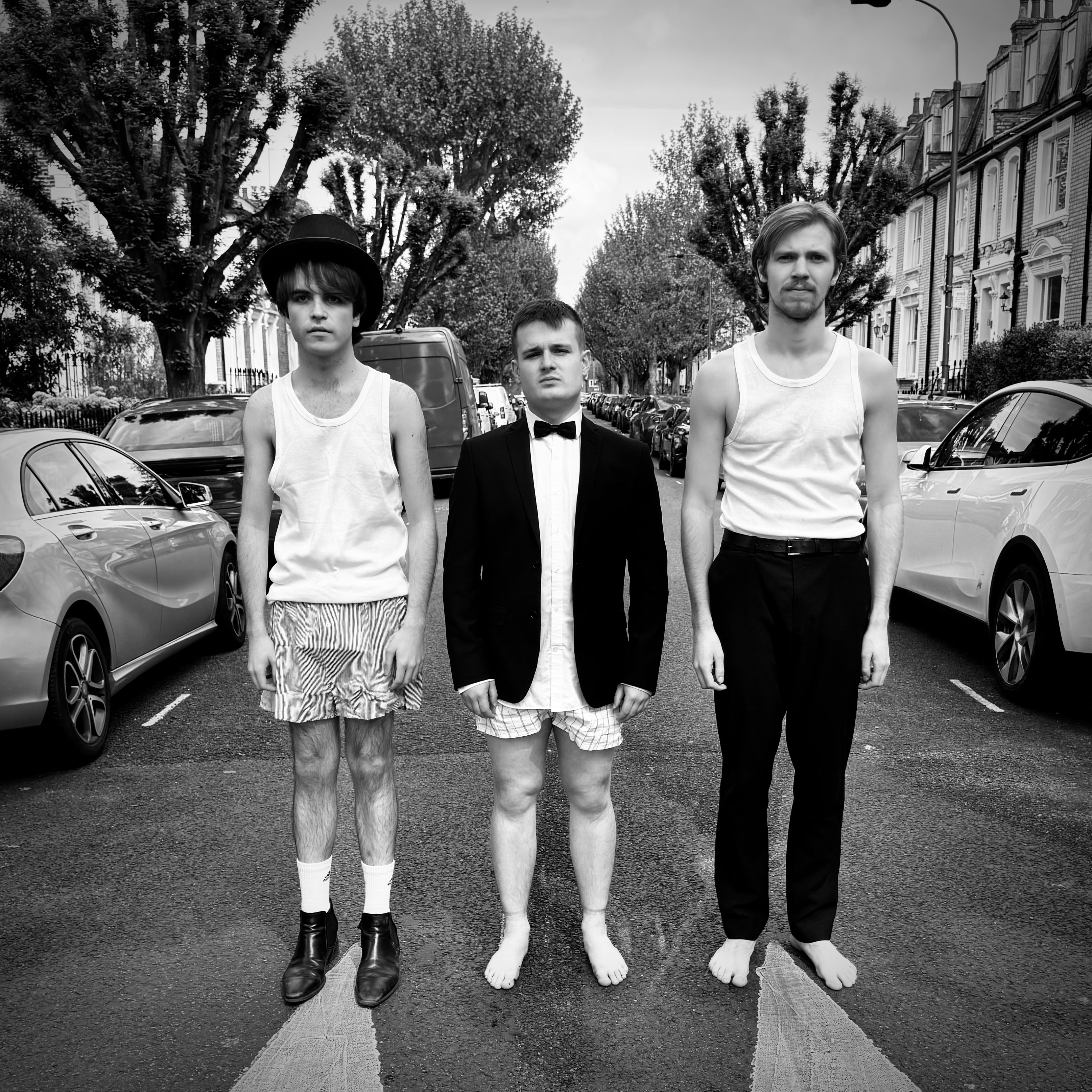 The Fiascoholics (who can only afford one suit between them)