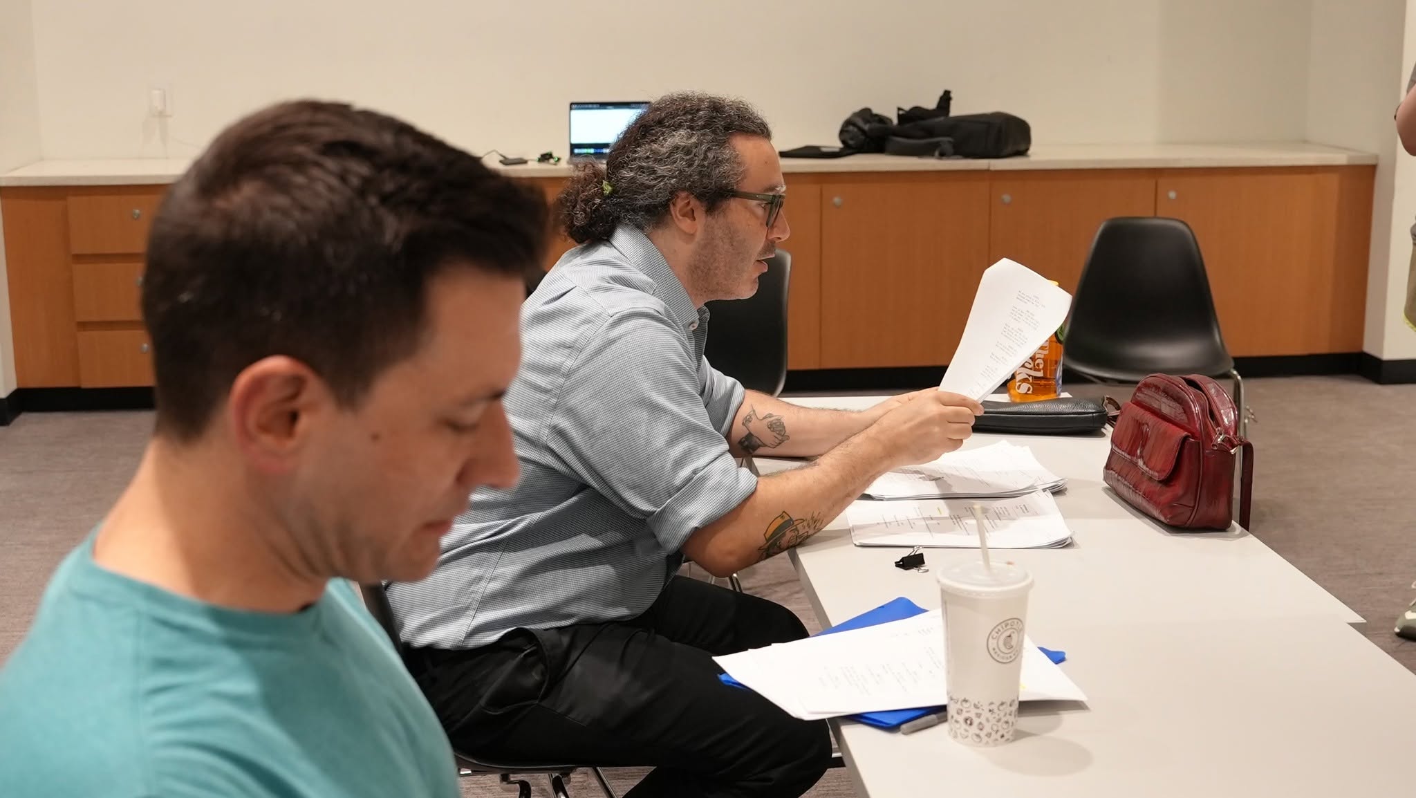 Behind the scenes at rehearsal. Our director Sean leading a scene.