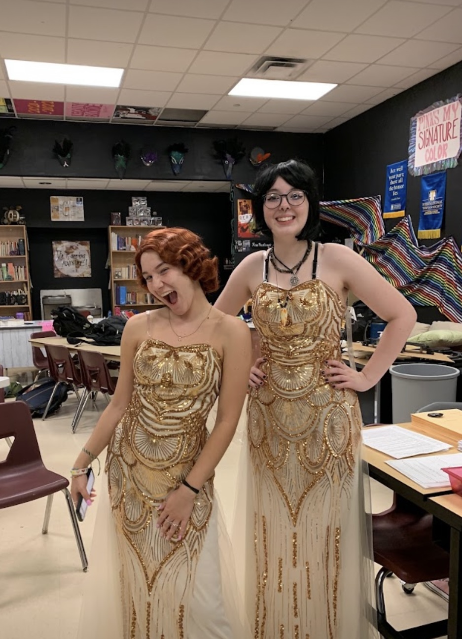 Ella Vinklarek (Roxie Hart) and Meghan O’Brien (Velma Kelly) pose with their flashy gold dresses for the end of Act 2!