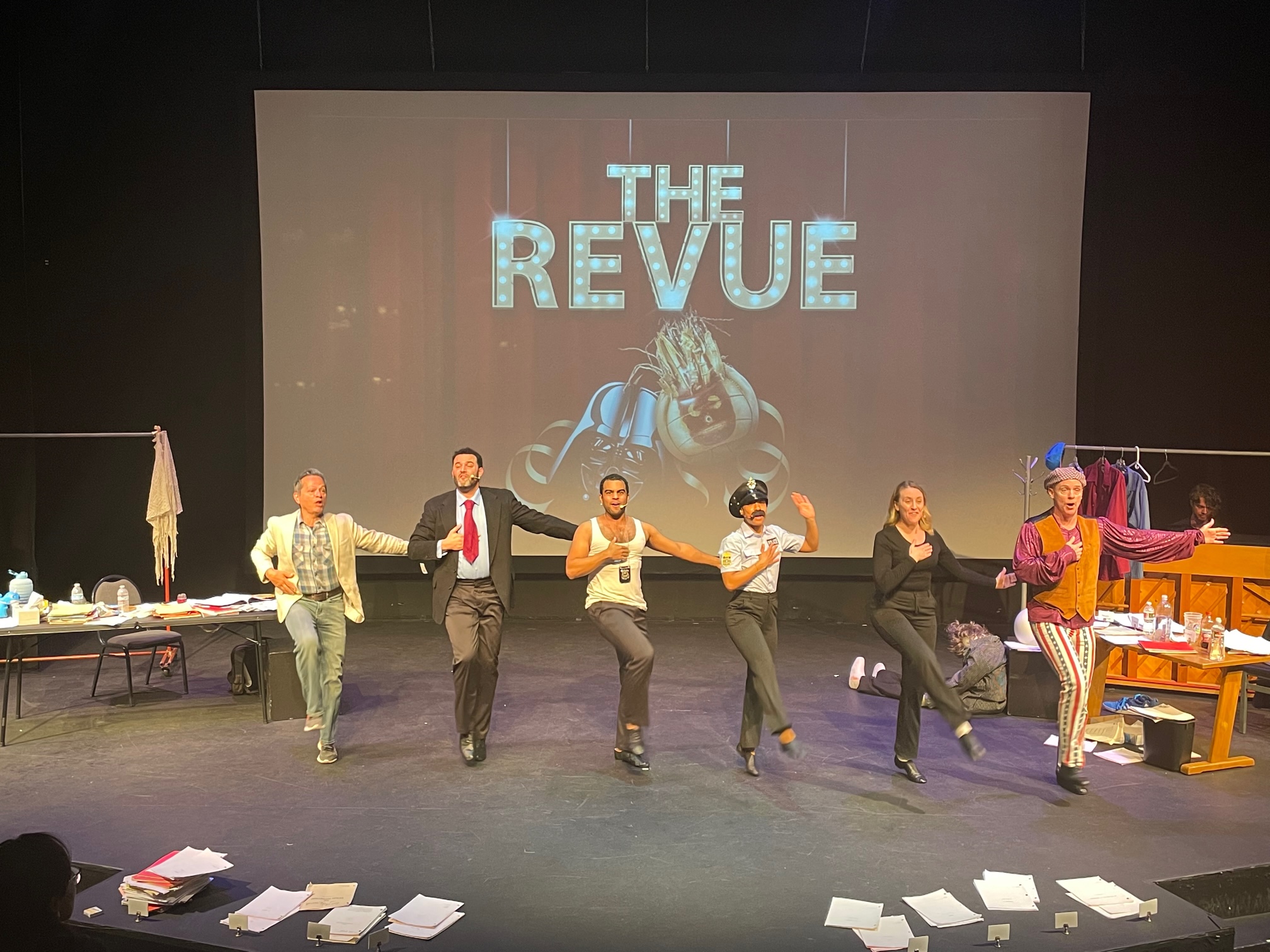 The Ensemble (L-R Rick Batalla, Travis Leland, Isaac Robinson-Smith, Tiffany Daniels, Katie DeShan, Matt Walker and Ryan Whyman (piano) perform “The REVUE’s” Theme Song.