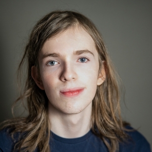 Niles Paxton (he/him) - Passing Man/Ensemble