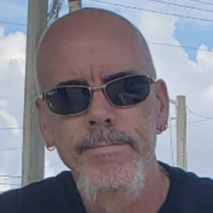 John Blessed - Set Designer