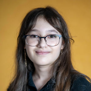 Nora McKinstry (they/them) - Matilda Wormwood