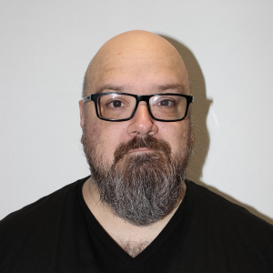 Christopher Scofield - Director