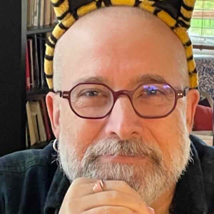 Bruce Akpan Hostetler - Director