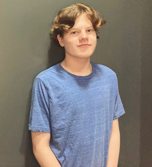 Finn Headrick - Immigration Officer / Ensemble