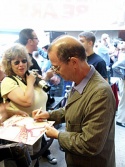 Joel Grey, currently in rehearsals as the  "Wizard" in WICKED, signs a "Goodbye Charl Photo