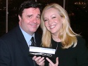 Nathan Lane with Susan Stroman showing off her letter opener Photo